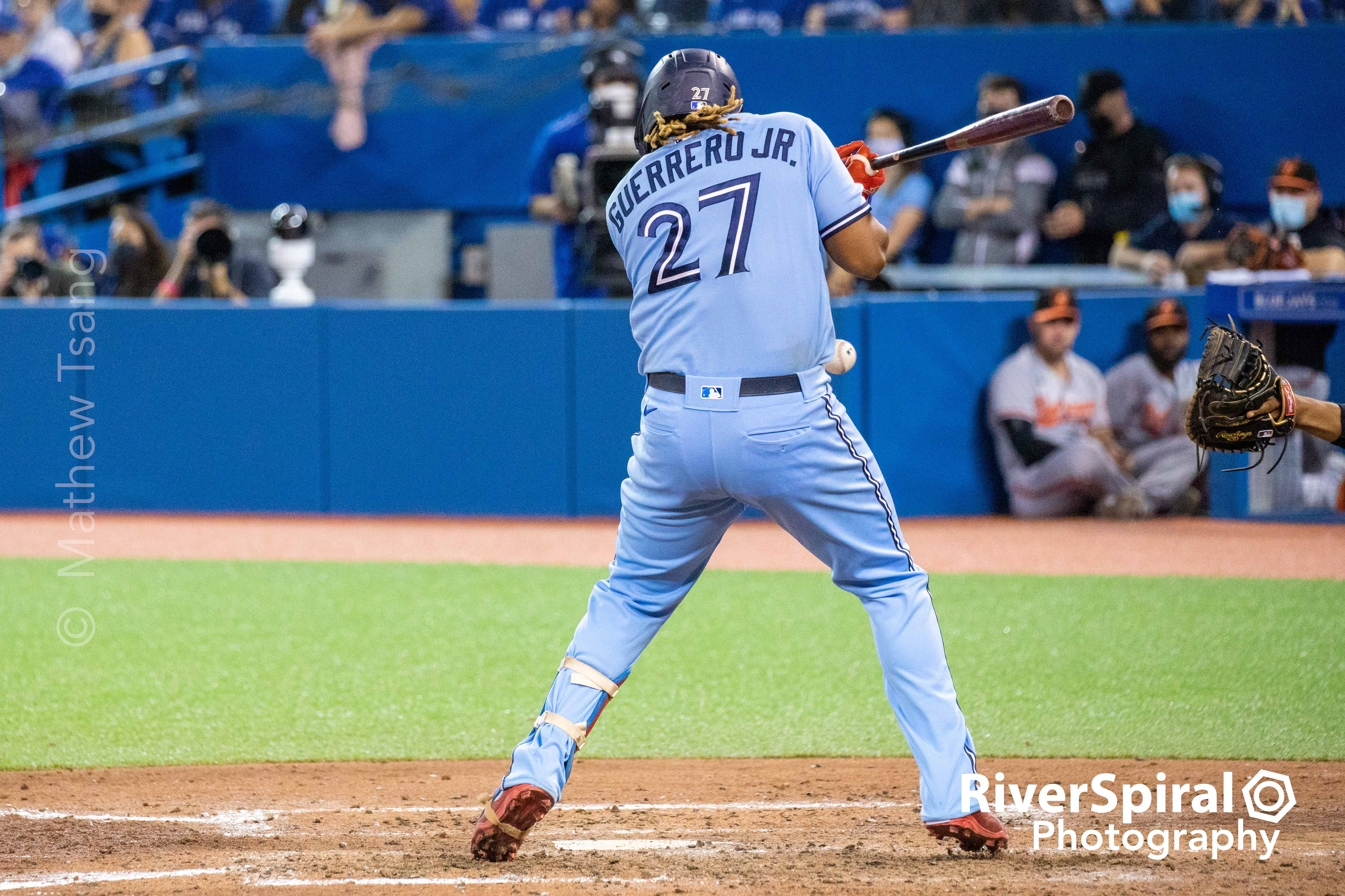 Toronto Blue Jay first baseman Vladimir Guerrero Jr. (27) gets hit by a pitch in the bottom of the 8th inning in MLB American League action against the Baltimore Orioles in Toronto. The Blue Jays won 12-4. Sunday, Oct. 3, 2021
