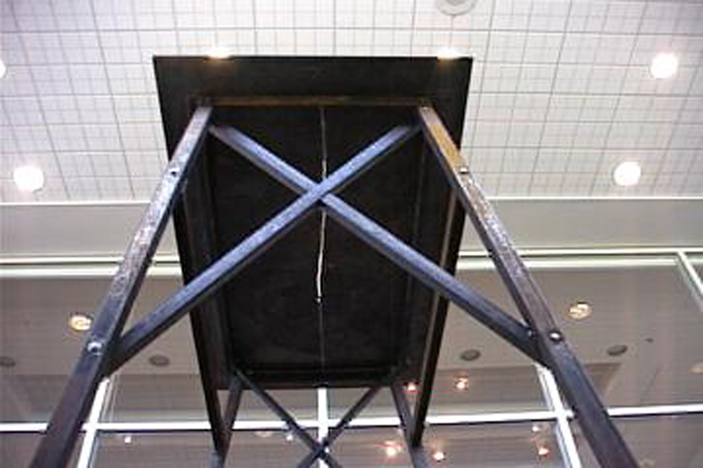 Partial view from the exhibition Misa negra. wood, metal. installation. variable dimensions.