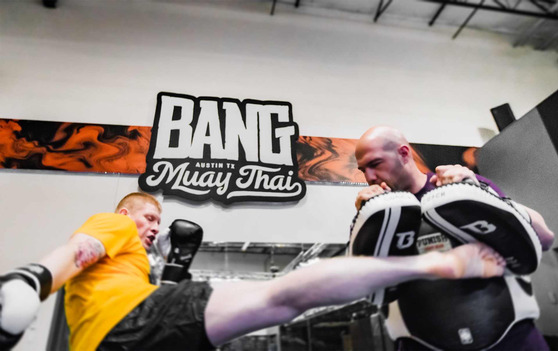 Photo taken in 2017 in the original Bang MT studio. Interior design included walls and mats with BMT logo and patterns.