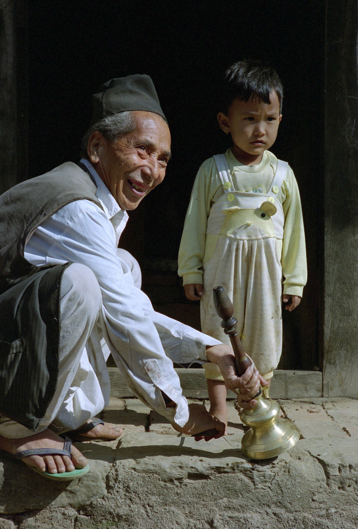 Man met kind, Nepal