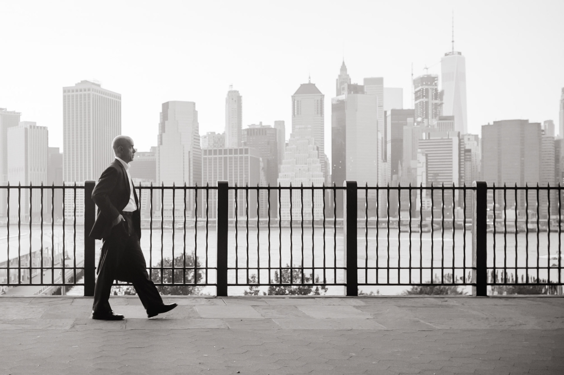 Striding confidently down the Brooklyn Heights Promenade