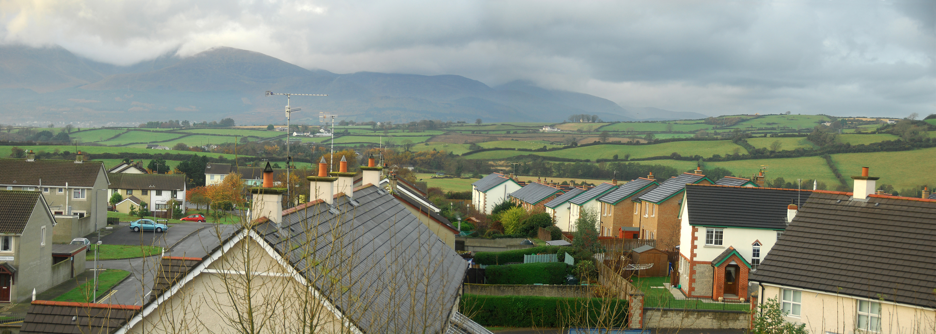 View of the Mourne Mountains from a window in Dundrum, NI