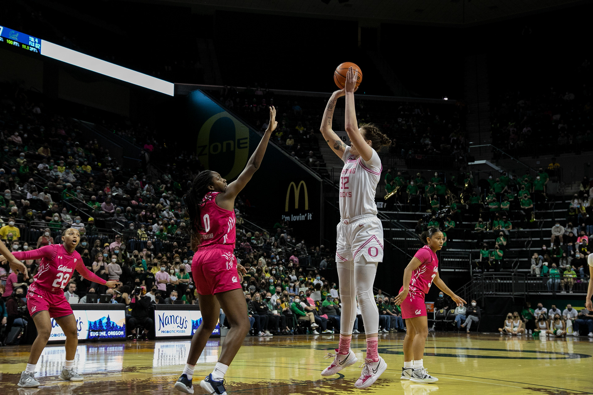Sedona Prince takes a jump shot over the Cal defender.