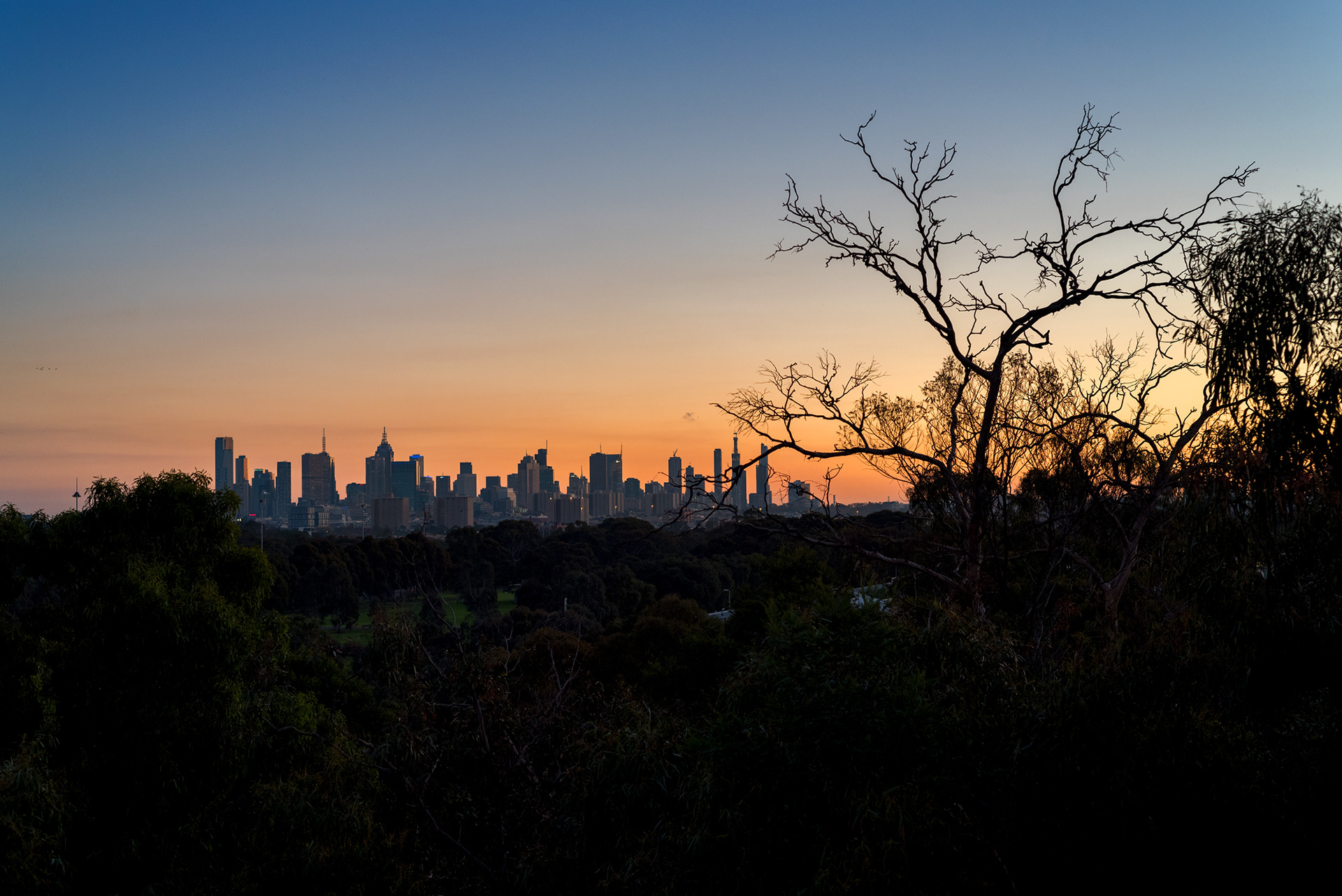 Sunset over the Wurundjeri Spur Lookout overlooking the Melbourne Central Business District