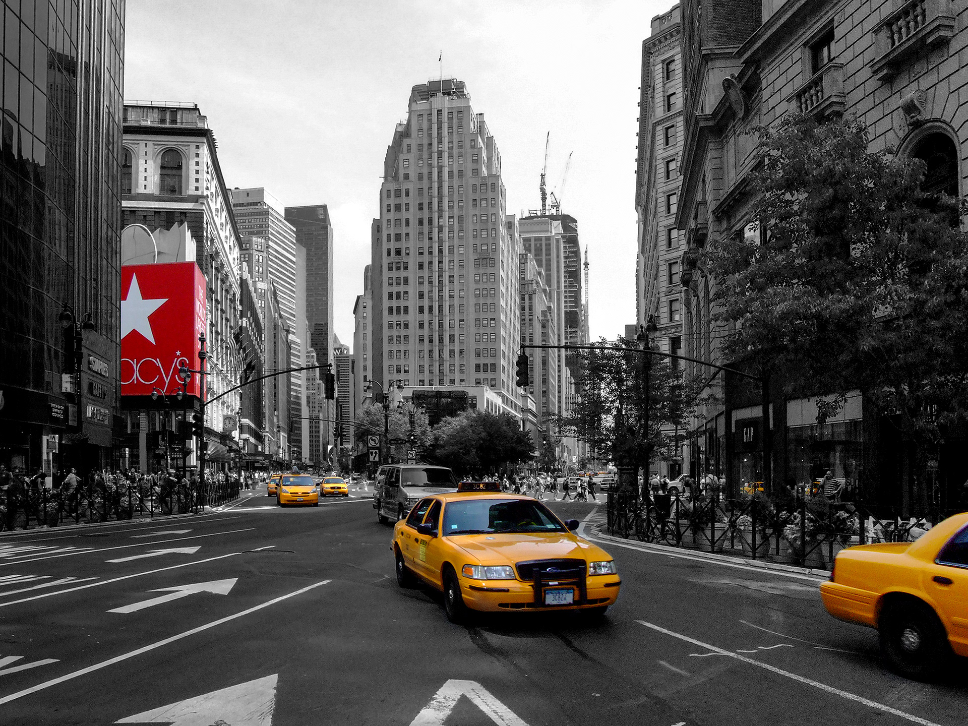 New York City yellow taxi cabs driving along Broadway and the Avenue of the Americas