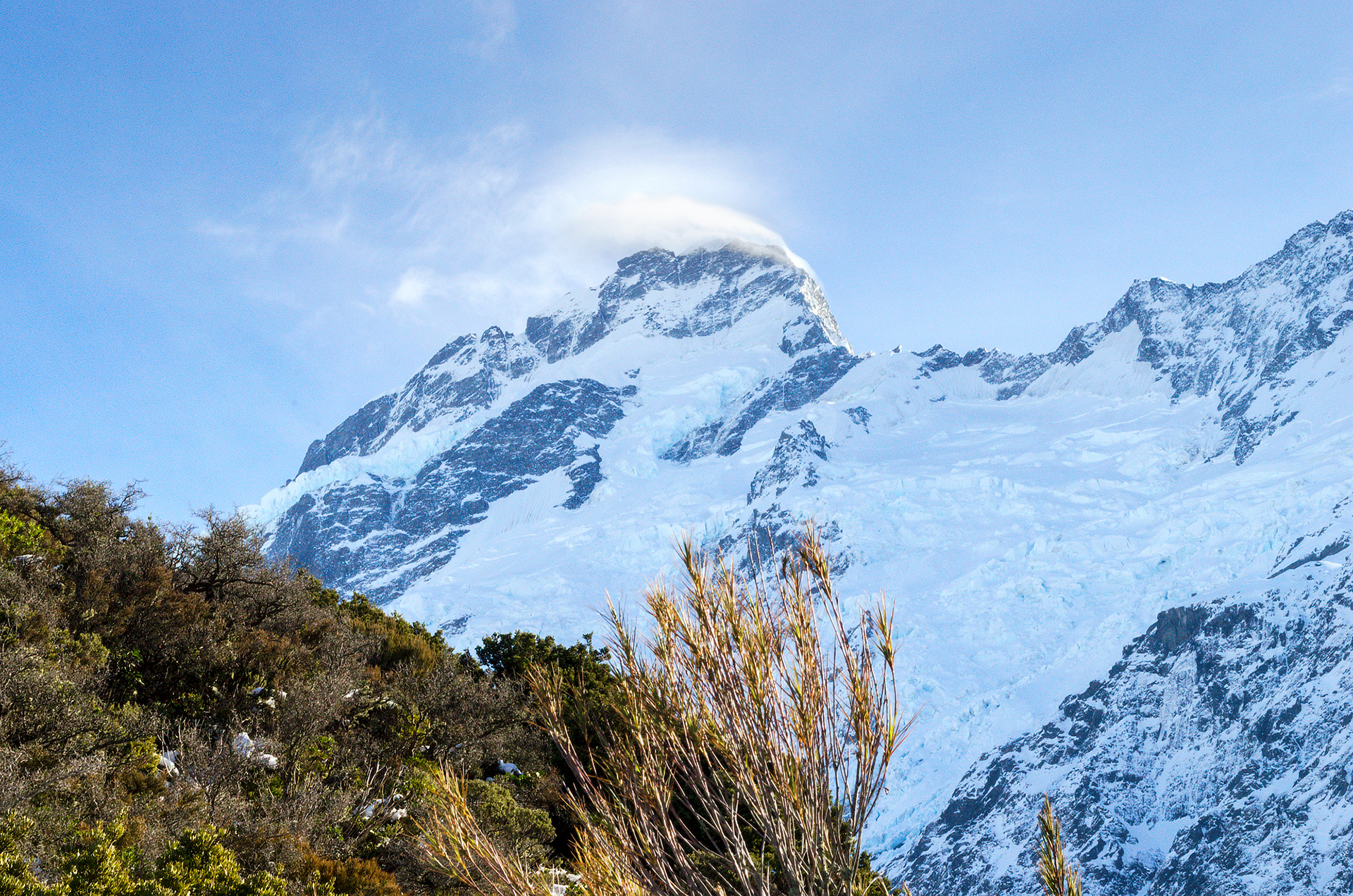 Snow blowing off the peak of Mt Sefton/ Maukatua in the Aroarokaehe Range of the Southern Alps of New Zealand