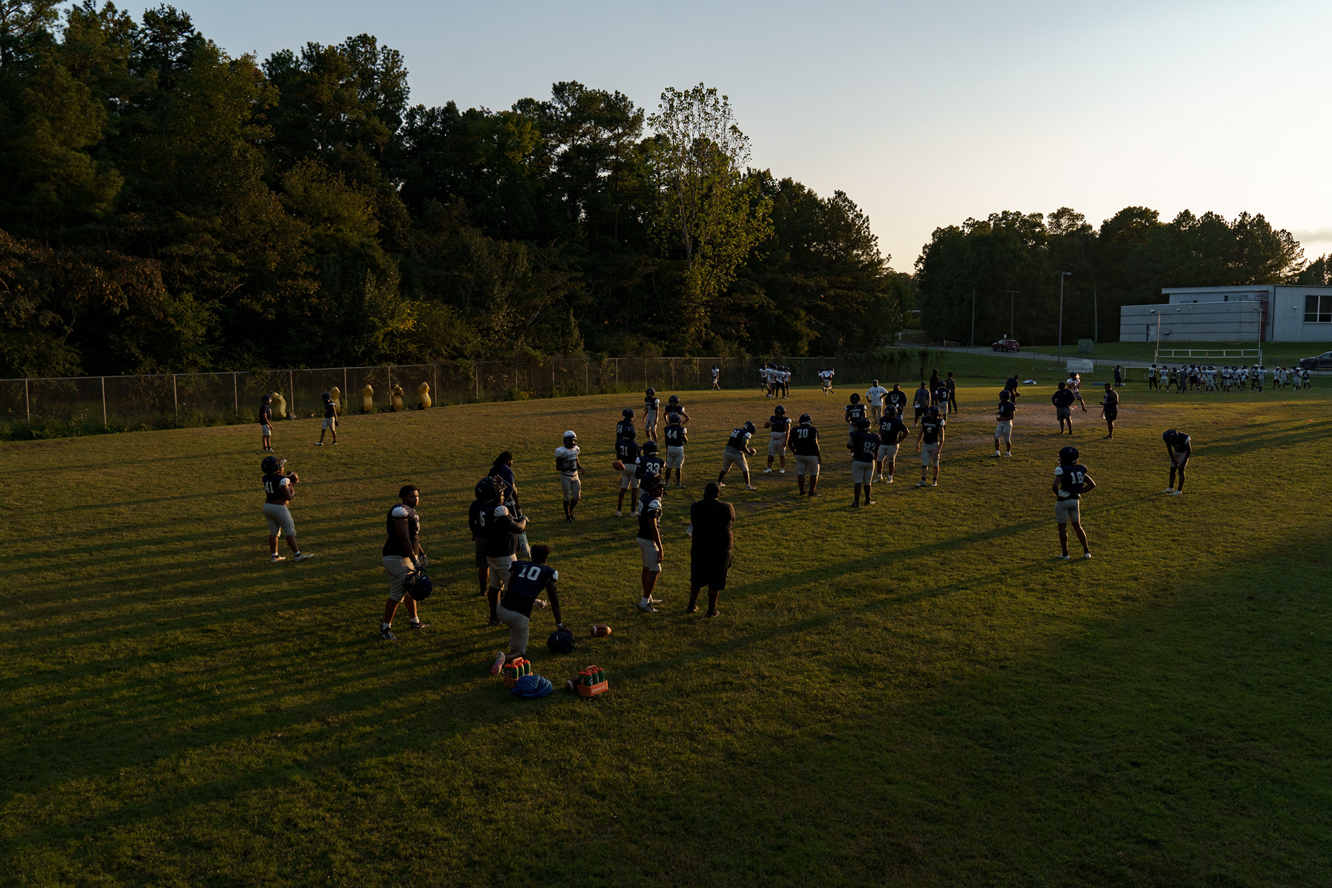 Hillside's players practice from the minute they get out of school until the sun goes down, four days a week. They share the field with the JV team, which many of them were on last year.