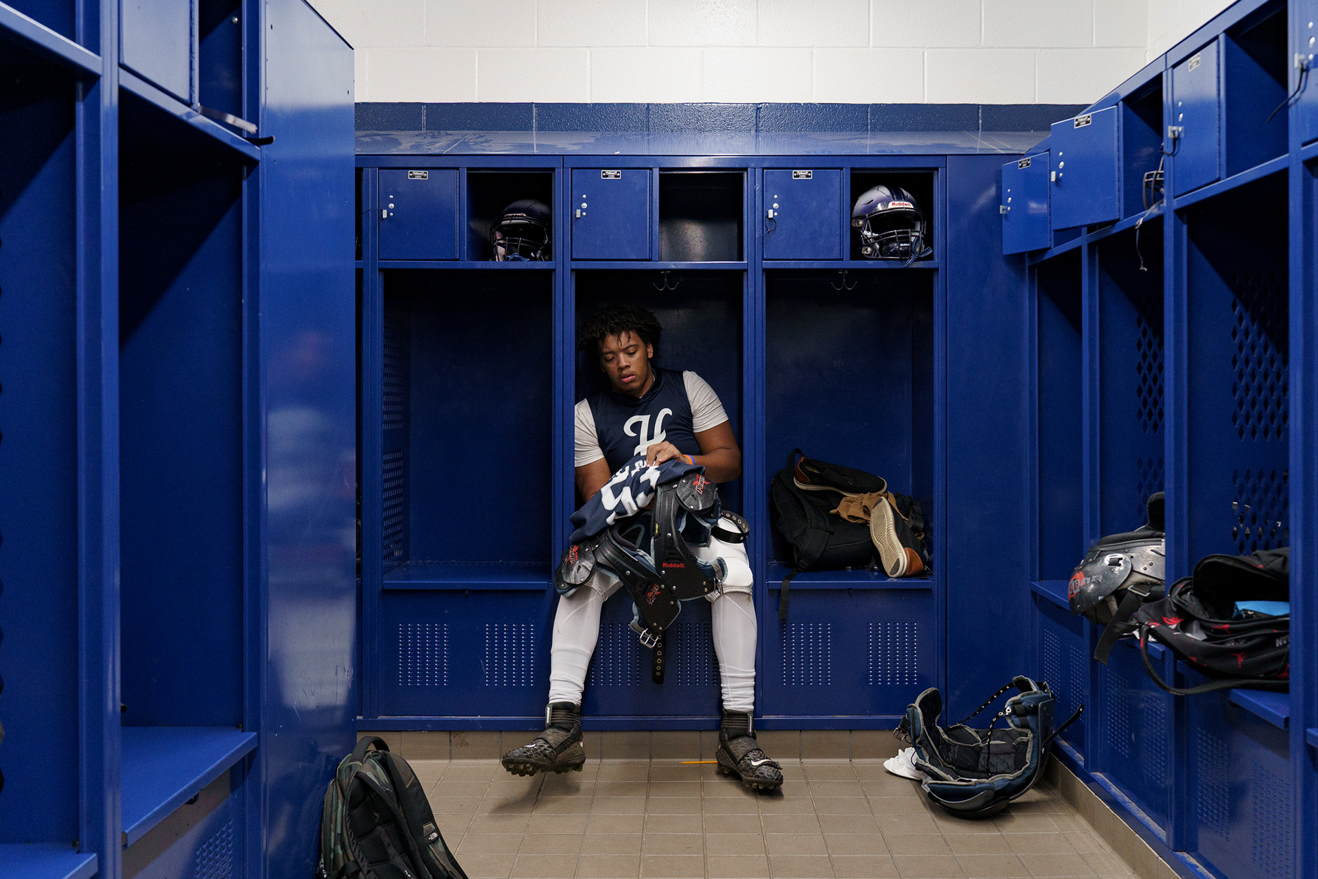 After losses, the Hillside locker room is silent as a team that hasn't truly won together takes off their gear and heads home after a long Friday night.