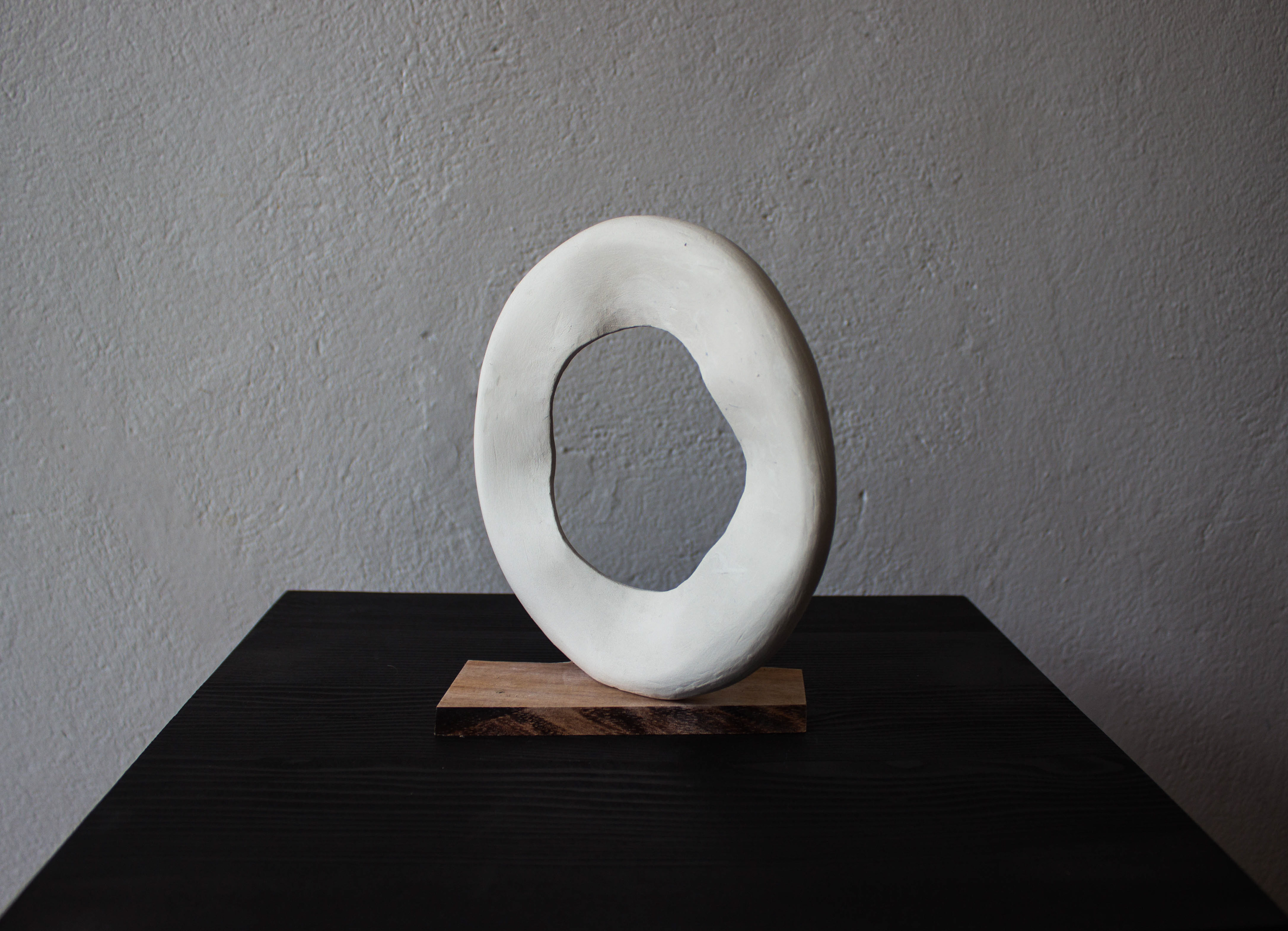 Perfect circle study, 2026, recycled clay, recycled blackwood, 150 x 150 x 20mm
