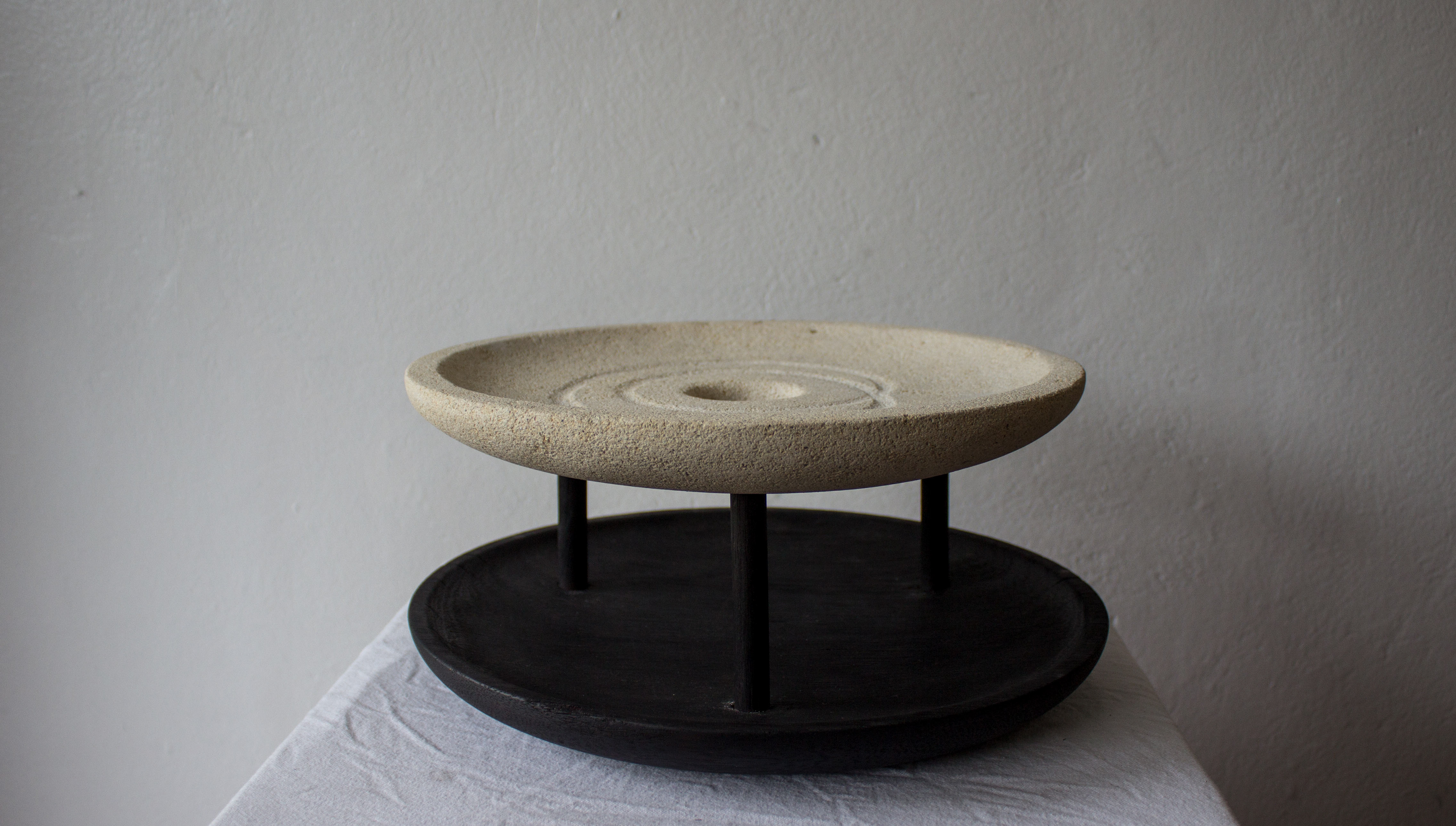 Sigil invites the audience to read a statement about sexual consent and while holding the statement in the thoughts carve the sigil deeper into the limestone bowl. Then brush the dust into the central hole so it is ready for the next person 