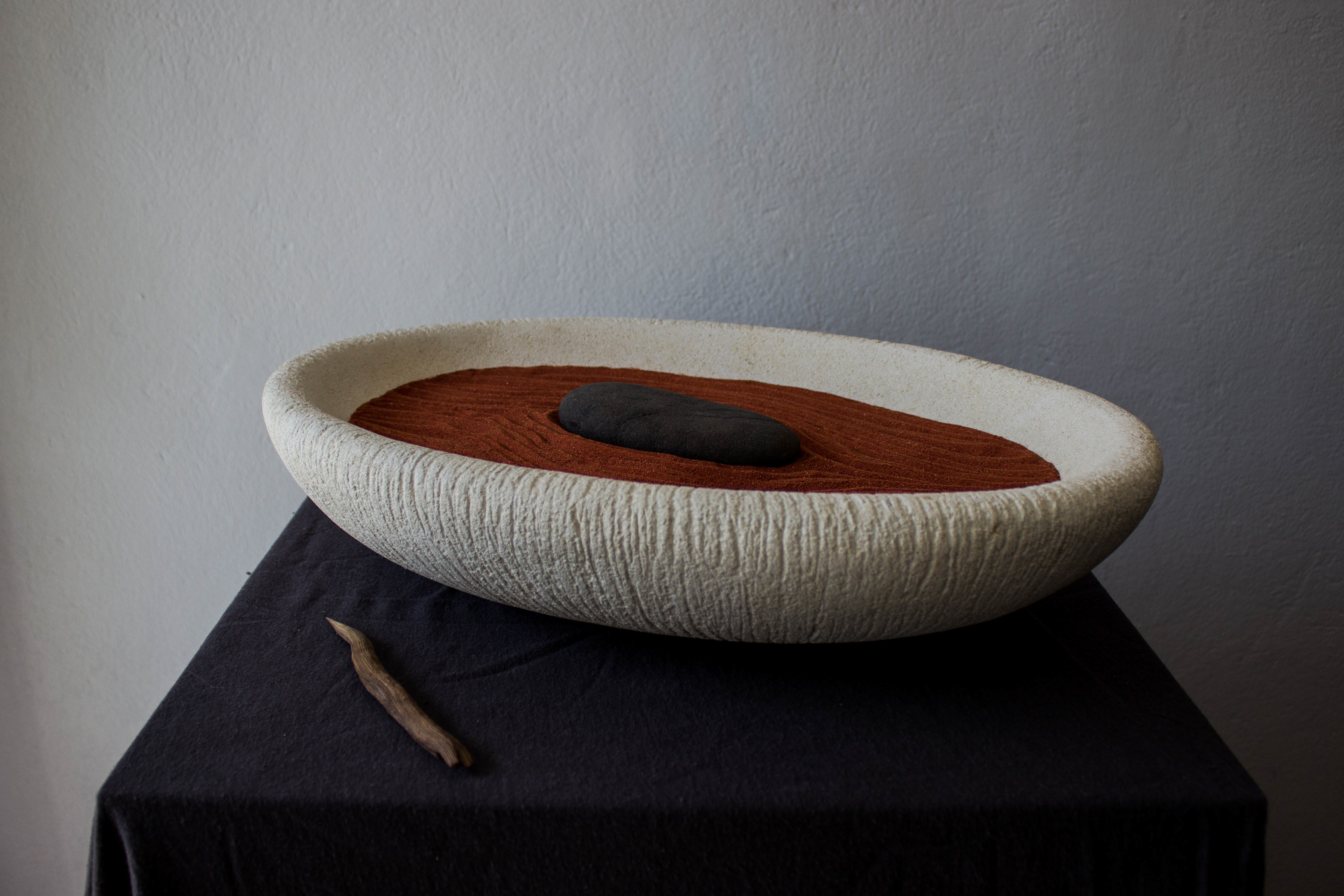 Sandpit, 2025, limestone, ocean stone, river stone, timber, red dirt, 100 x 300 x 440mm, Darcy Shilton