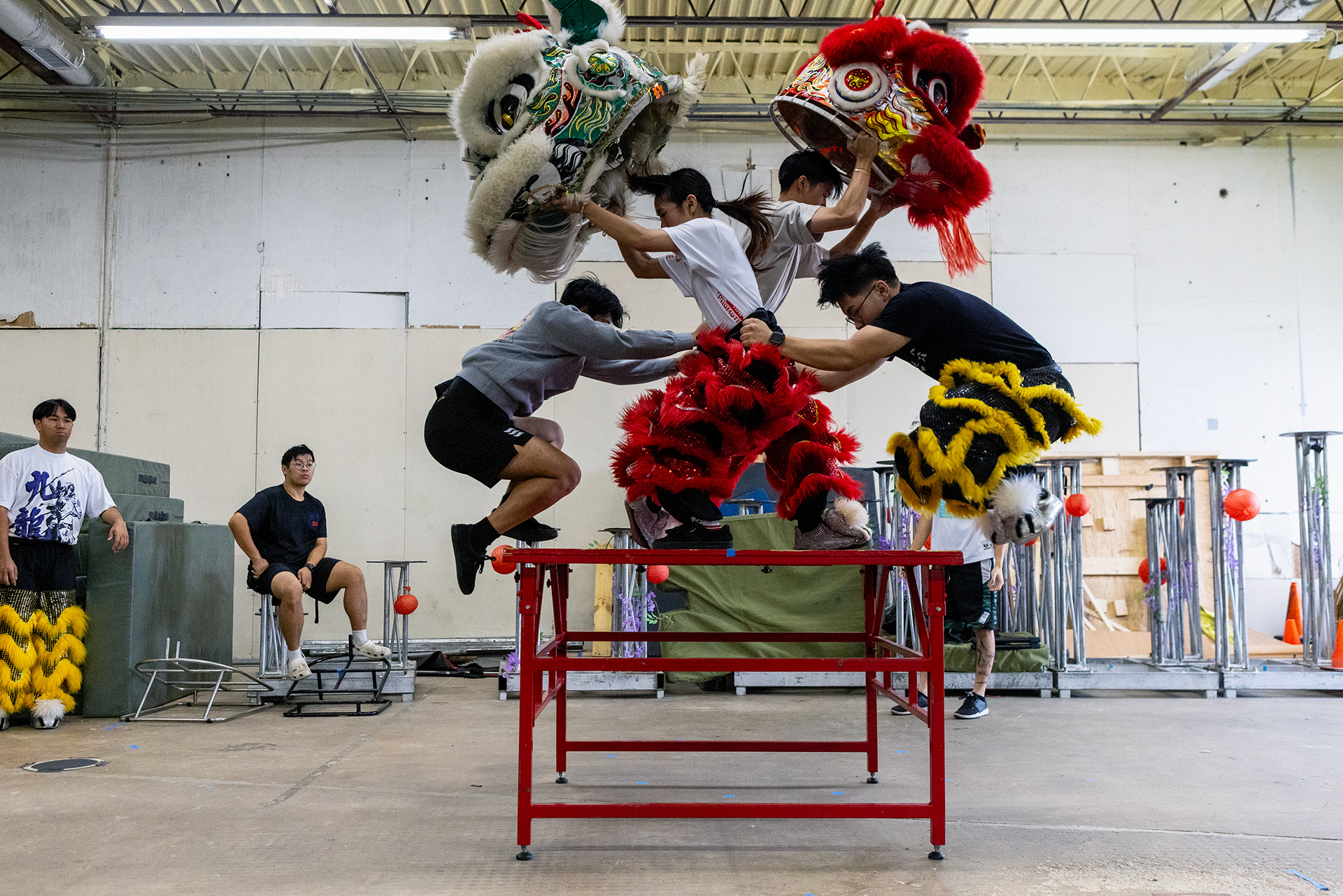 JL Lion Dance troupe members practice table dancing in their practice facility in Garland, Texas on Oct. 18, 2025.