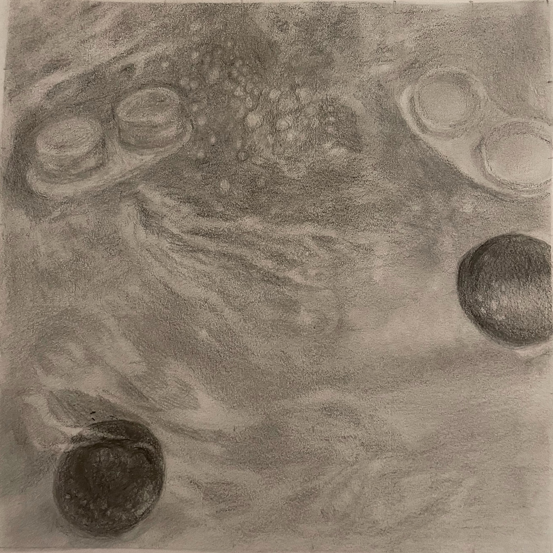 Graphite contact-lense cases in my filled sink