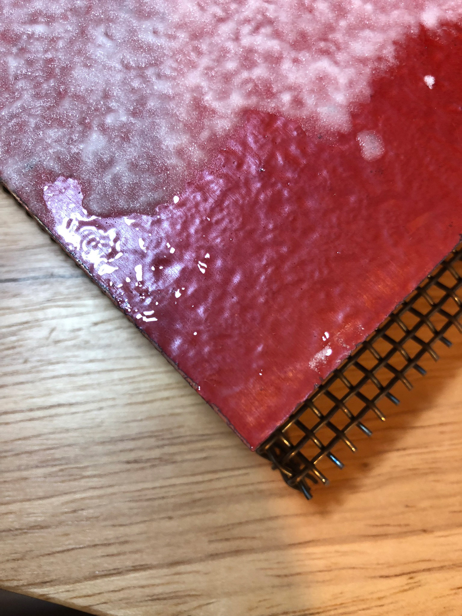 The layers of flux over copper.