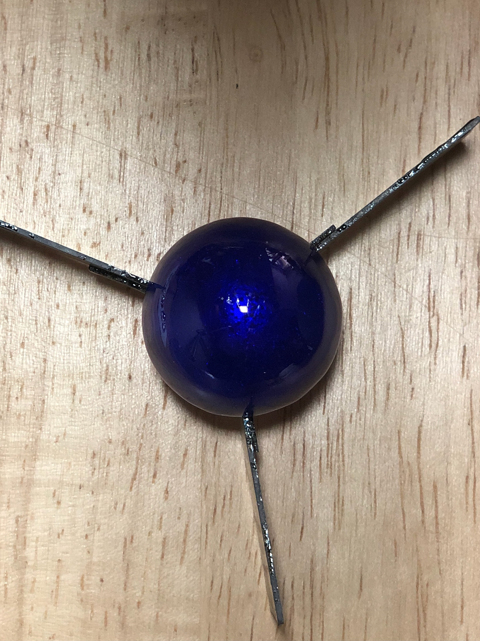 Silver hemisphere with the Royal blue hot enamel coating. Hand made.