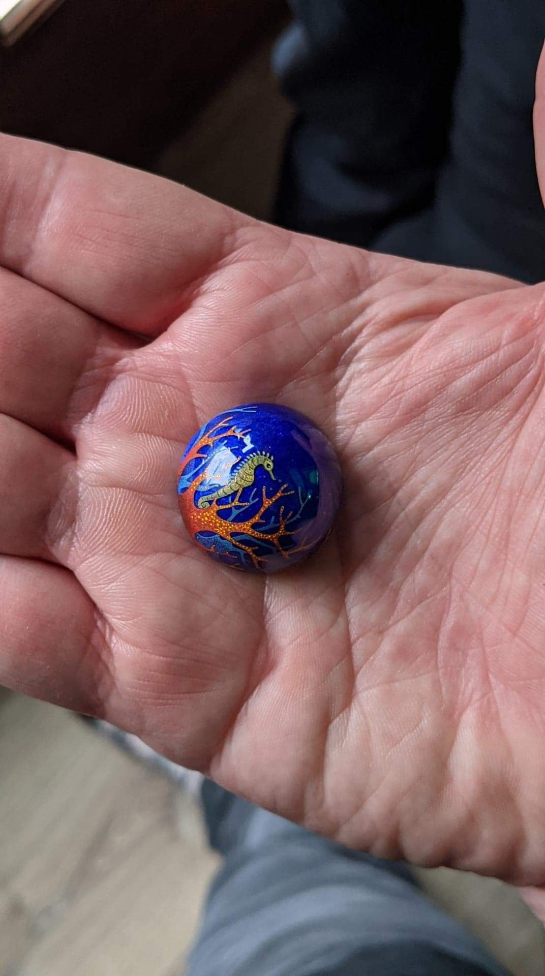 Silver hemisphere with the royal blue transparent hot enamel coating. Miniature painting with the overglaze colours. Hand made.