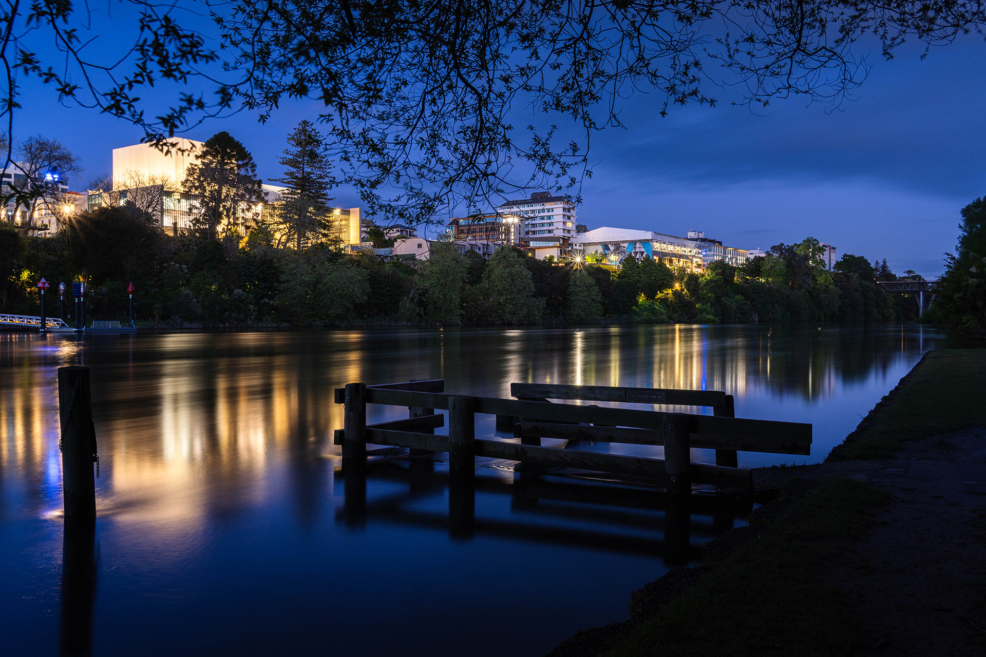 Blue hour long exposure of Hamilton city by the fast moving Waikato River