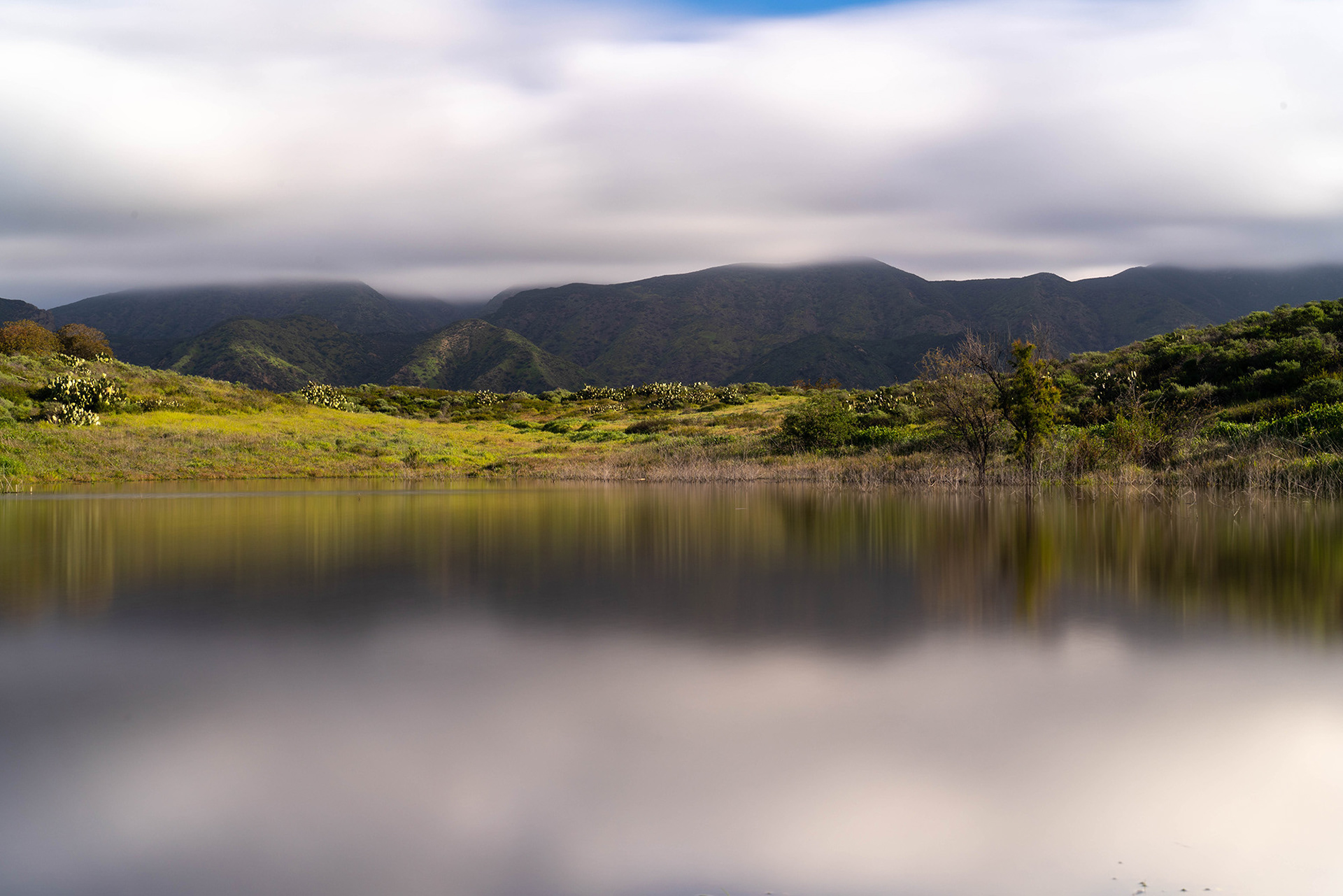 California landscape showing a vernal pond with the Saddleback mountains in the background