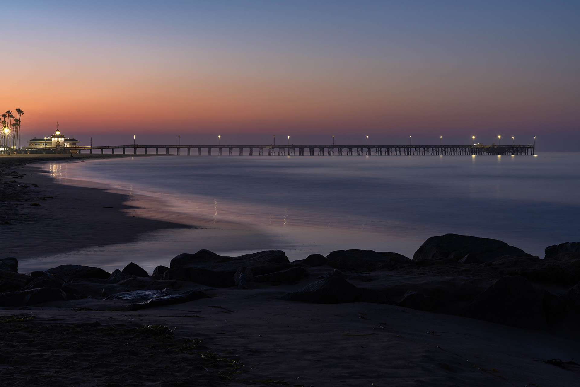 California seascape of a pier in the predawn light