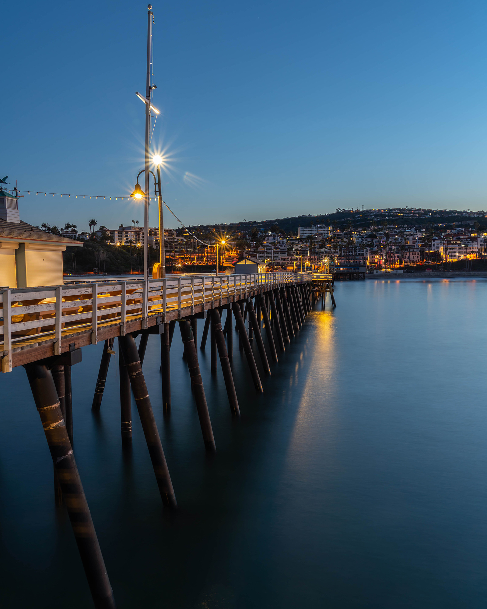 California seascape image of a pier in the early morning light