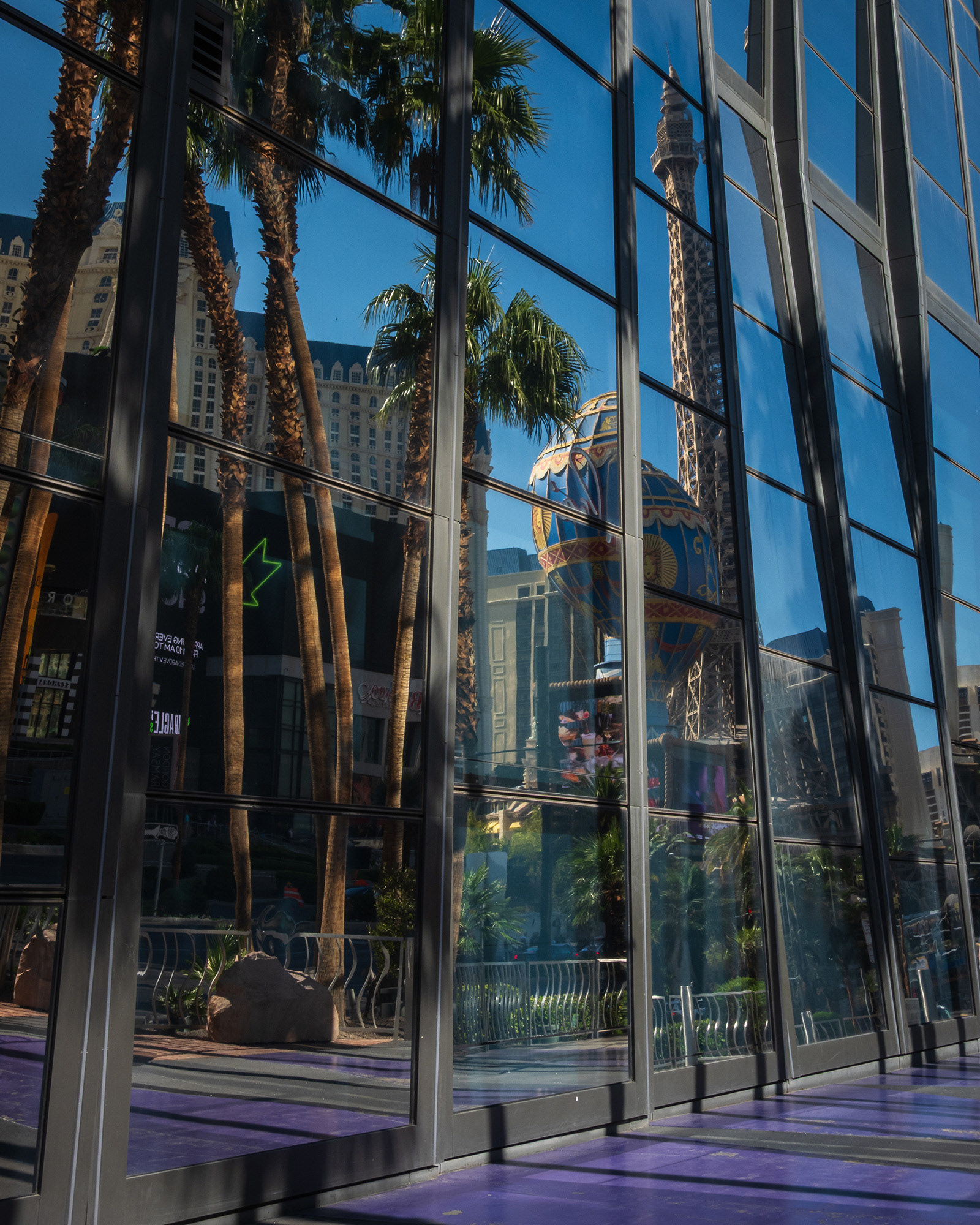 Broken reflections of the Paris balloon and Eiffel tower in the windows of the Cosmopolitain building in Las Vegas