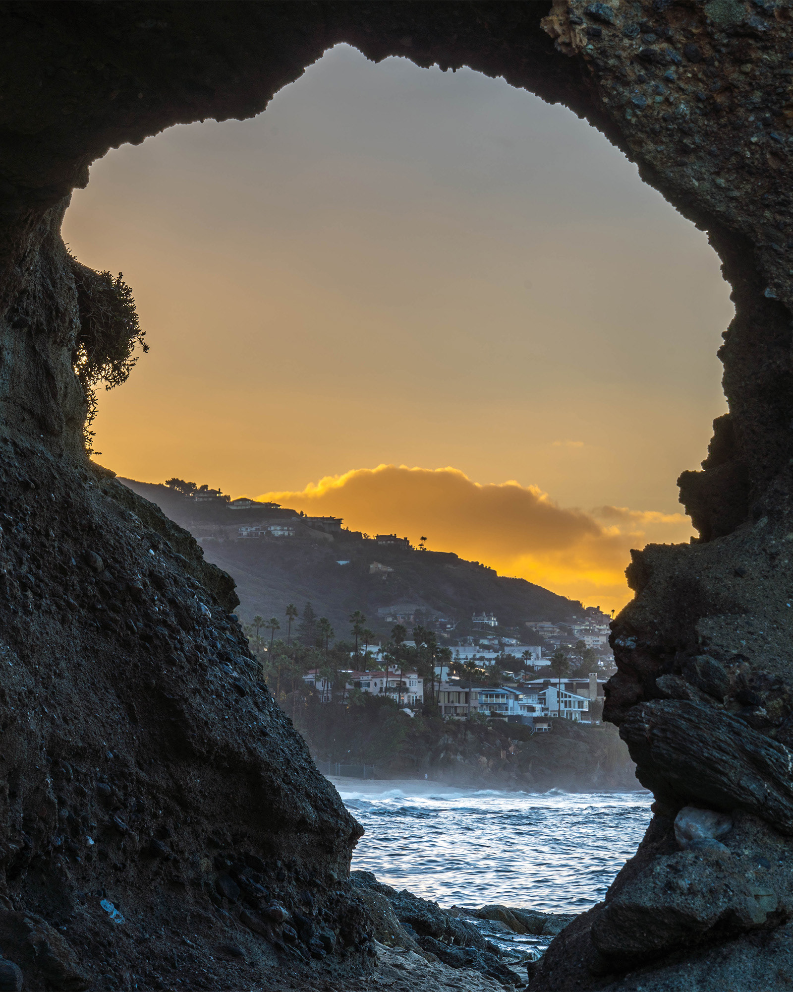California seascape dawn through a rock arch