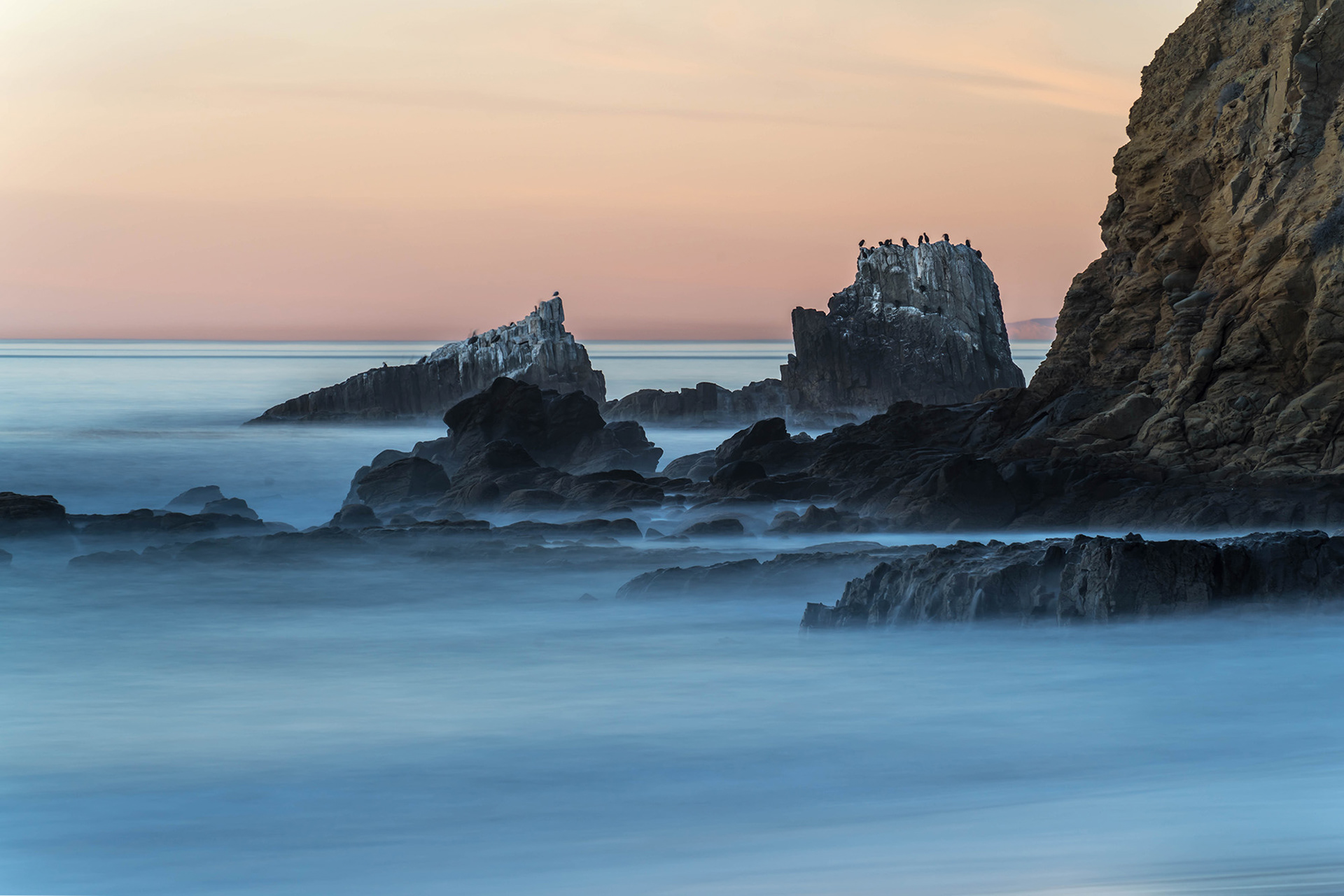 California rocky headland long exposure seascape