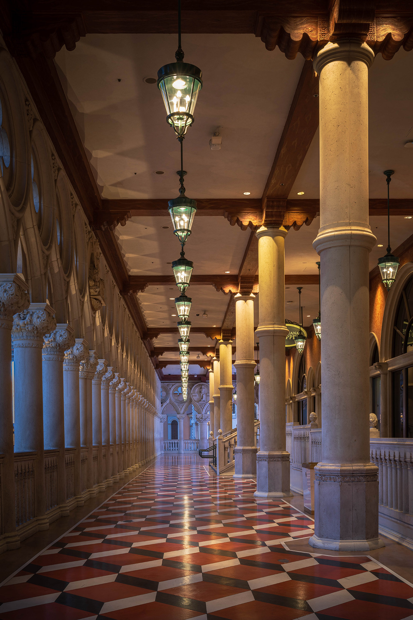 Pedestrian passageway internal to the Venetian shown in the blue hour before sunup