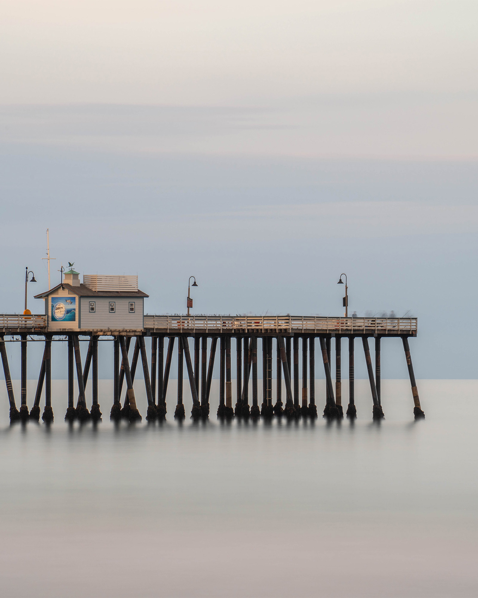 California seascape end of the pier on a still morning