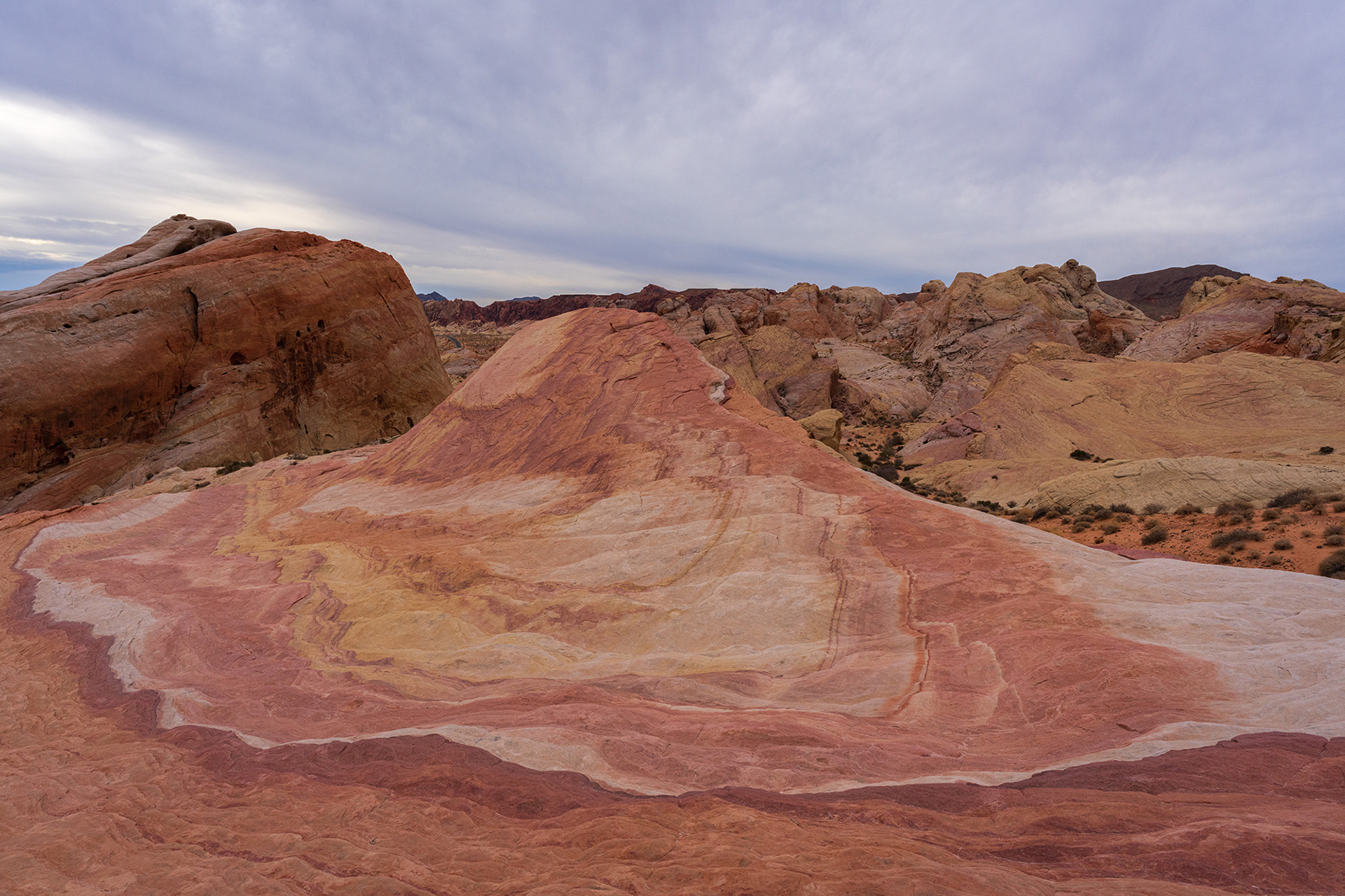 Scene showing the colourful rock striations on the Crazy Hill rock formation in the Nevada landscape