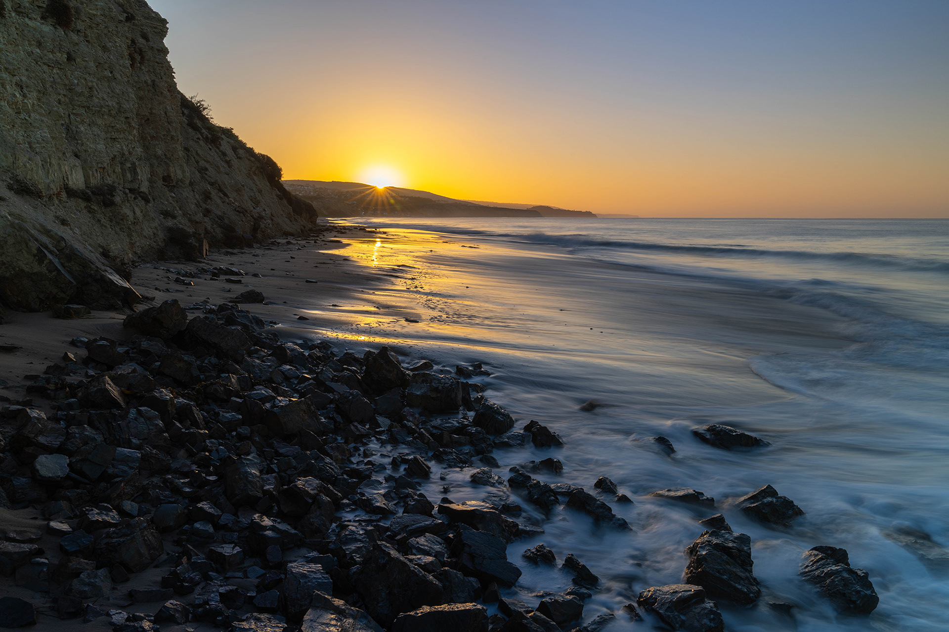 California seascape beach with vibrant sunrise