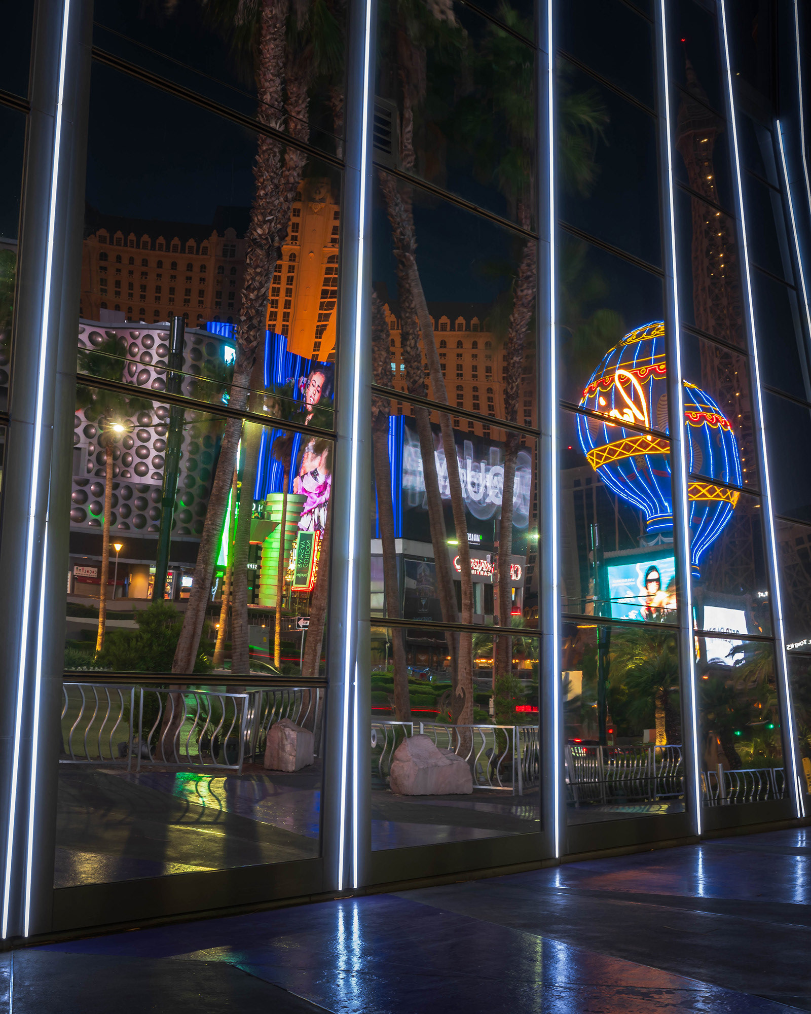 Broken reflections of Pariis Las Vegas in the windows of  the Aria building