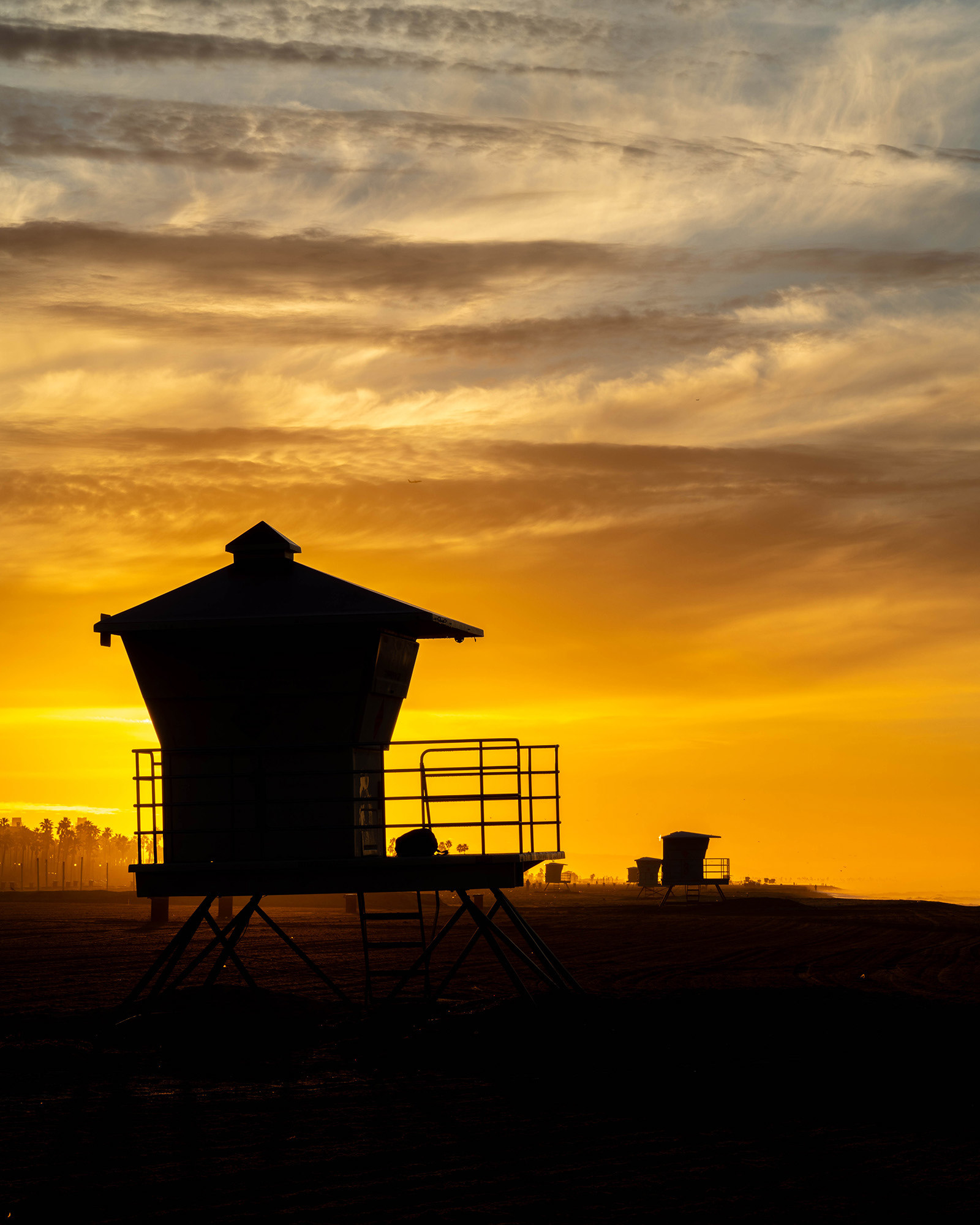 California beach lifeguard huts at sunrise