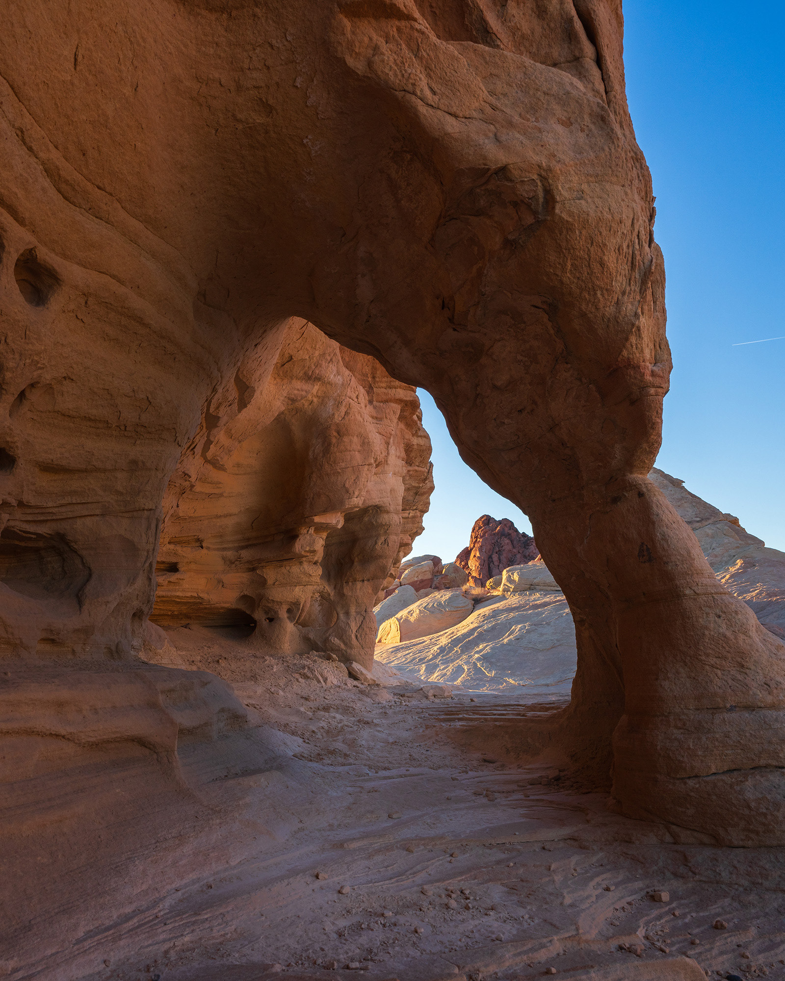 A view through one of the arched limbs of Yellow Arch showing the red sandstone rock texture
