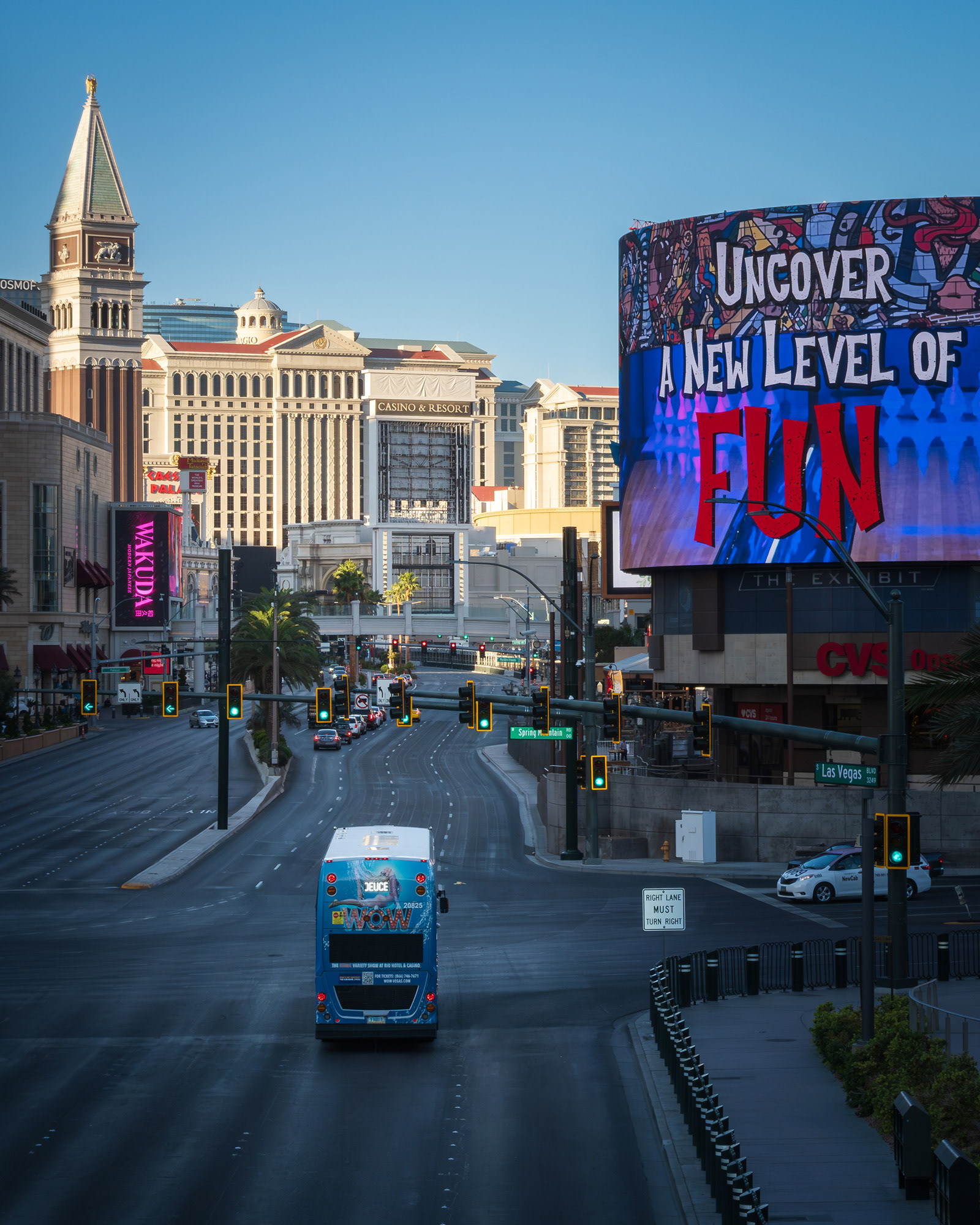 Solitary Deuce double-decker bus driving down the Las Vegas Strip in the early morning