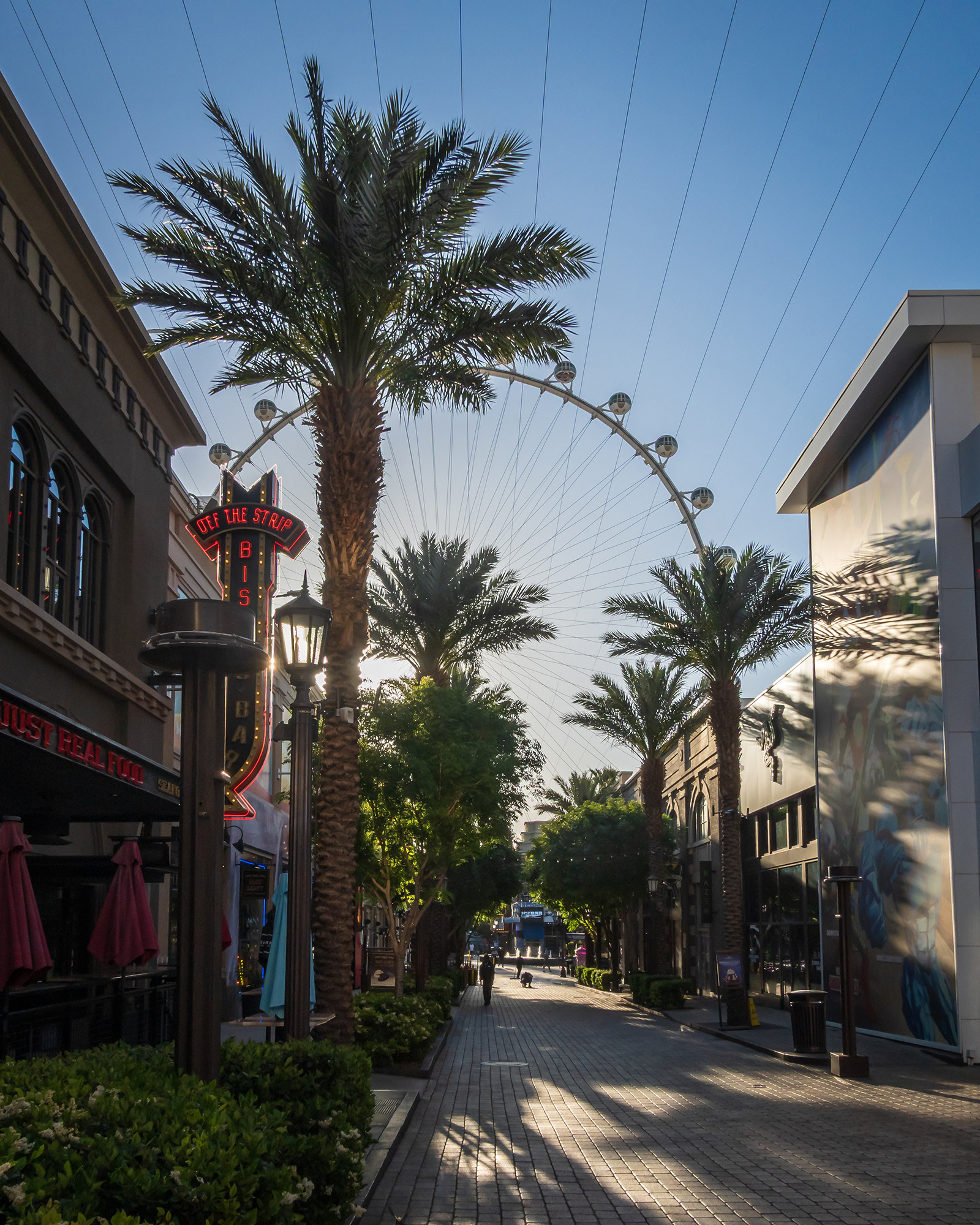 View along the LINQ Promenade towards the High Roller observation wheel in the early morning