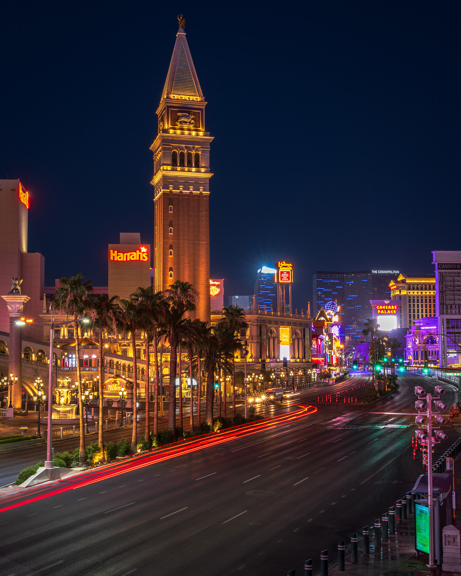 View across The Strip towards the Venetian casino and hotel buildings in the early in the early morning predawn light