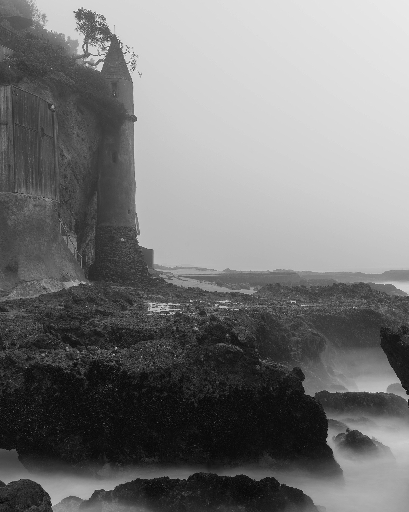 California beach tower on a misty morning