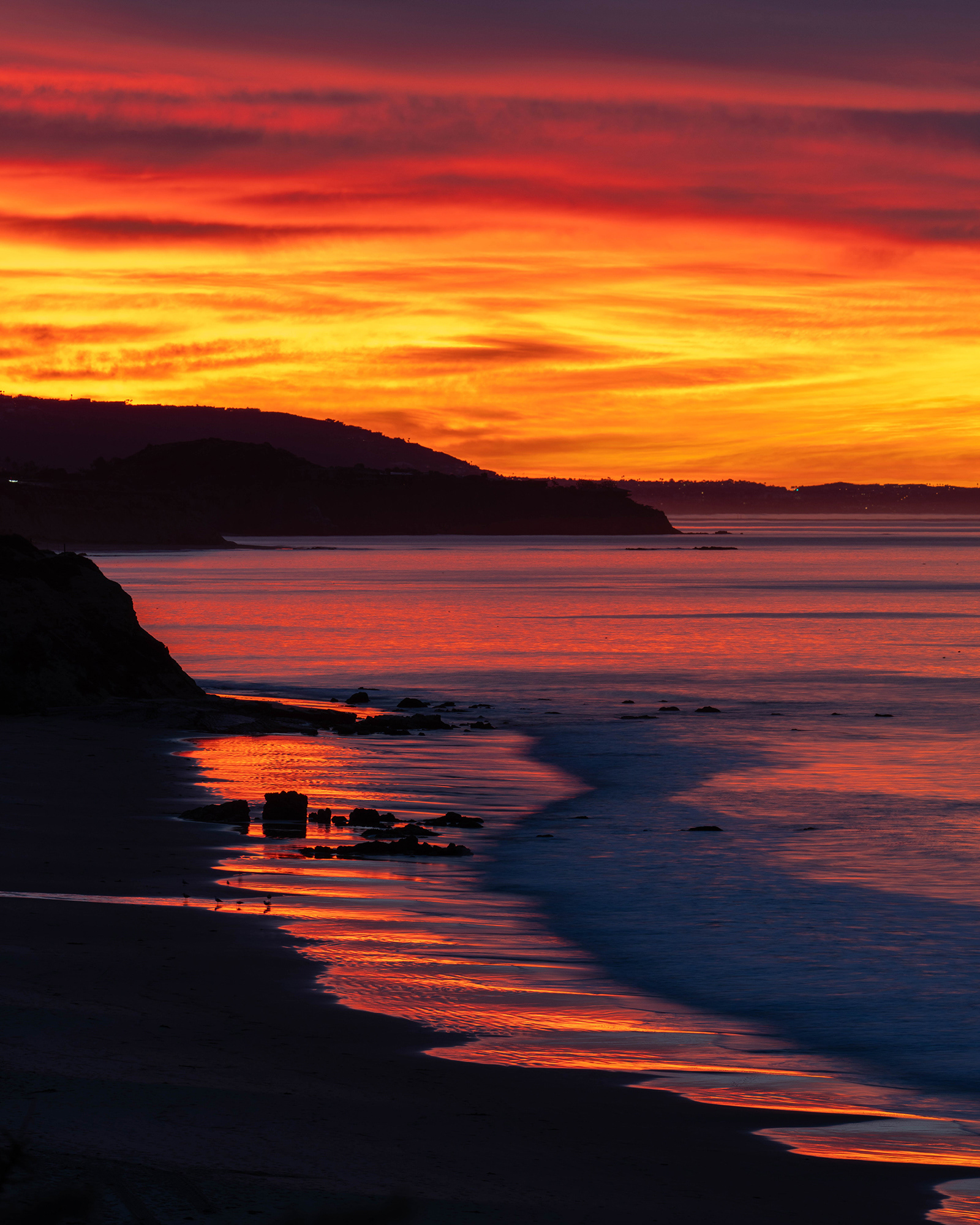 Vibrant early morning sunrise over California beach