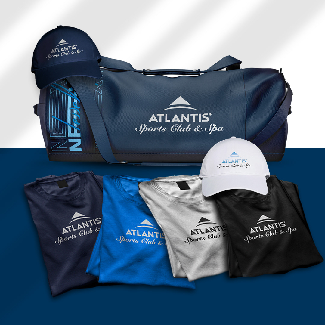 Created branded duffle bags and t-shirts featuring the Atlantis tagline “Bringing Fitness to the Next Level,” extending the club’s visual identity into retail merchandise.