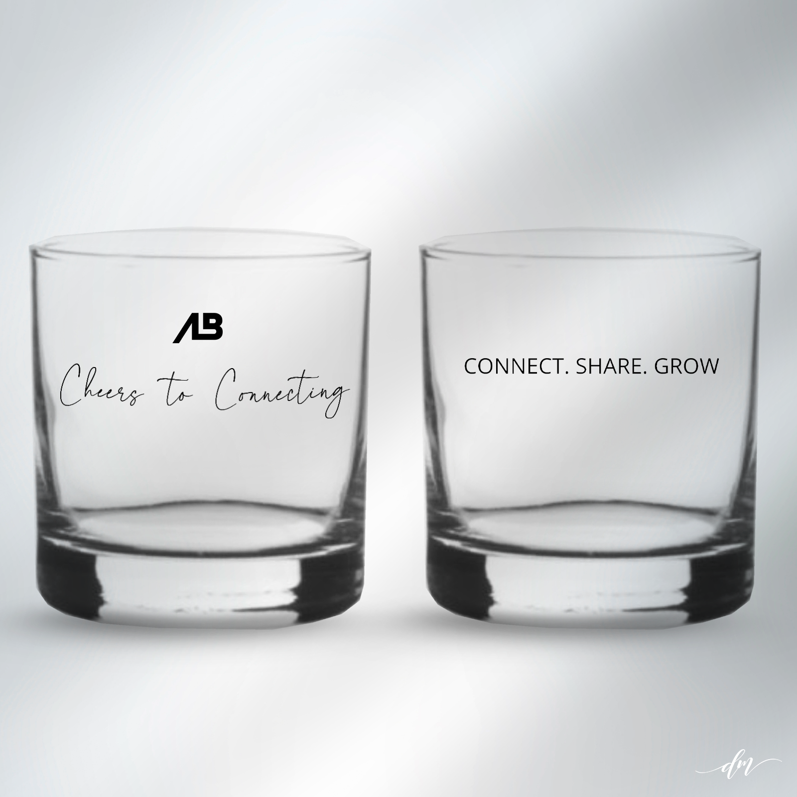 Custom networking rock glasses featuring Cheers to Connecting and Connect Share Grow messaging