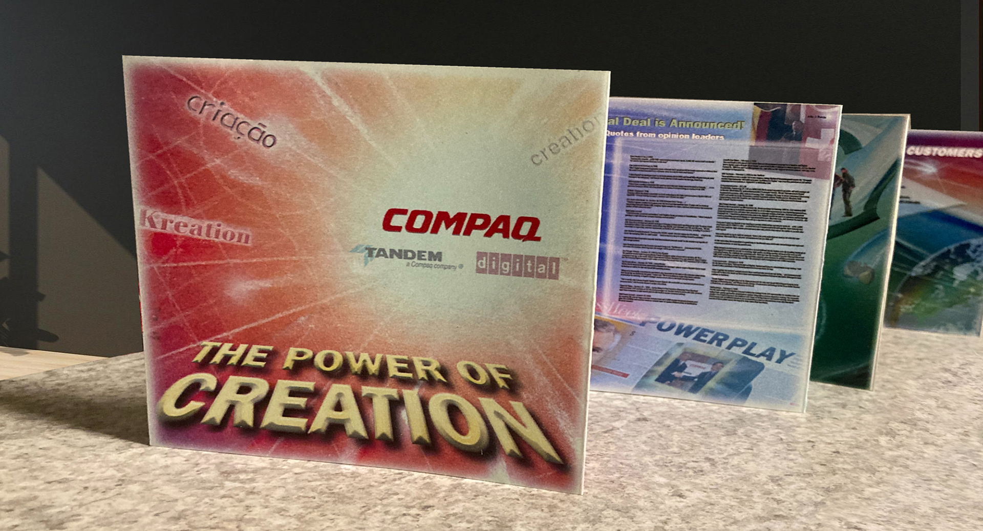 Ten-panel handout titled Power of Creation, created for the Digital Equipment–Compaq merger transition. The piece blends corporate history, leadership principles, technology breakthroughs, change-management insights, and recognition of key people into a cohesive visual story. Designed for both handout and large-format lobby poster display, showcasing the adaptability of a unified visual system across print scales.