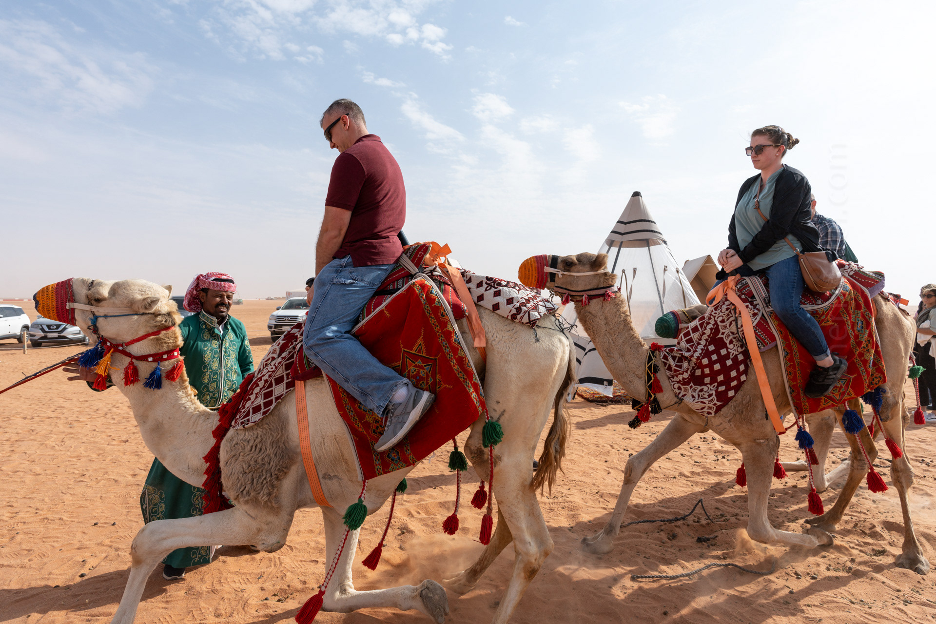 Getting on a camel.