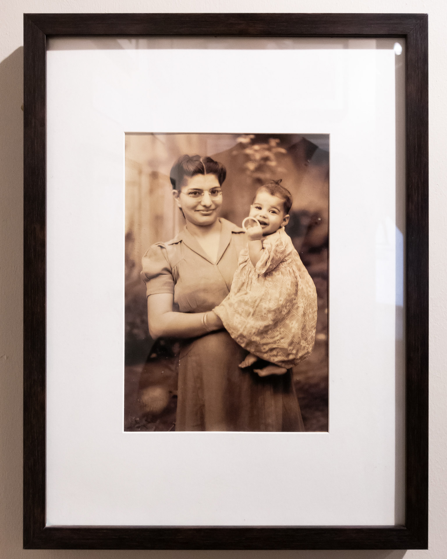 A seven month old Mercury with his mother at their family home in Zanzibar.