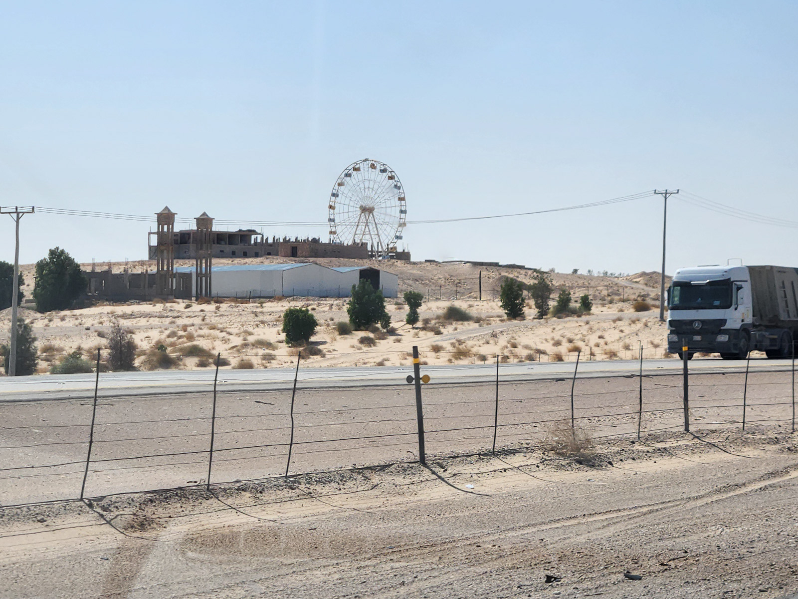 Out in the middle of the desert there's this abandoned Ferris wheel that's clearly part of a never completed real estate development.