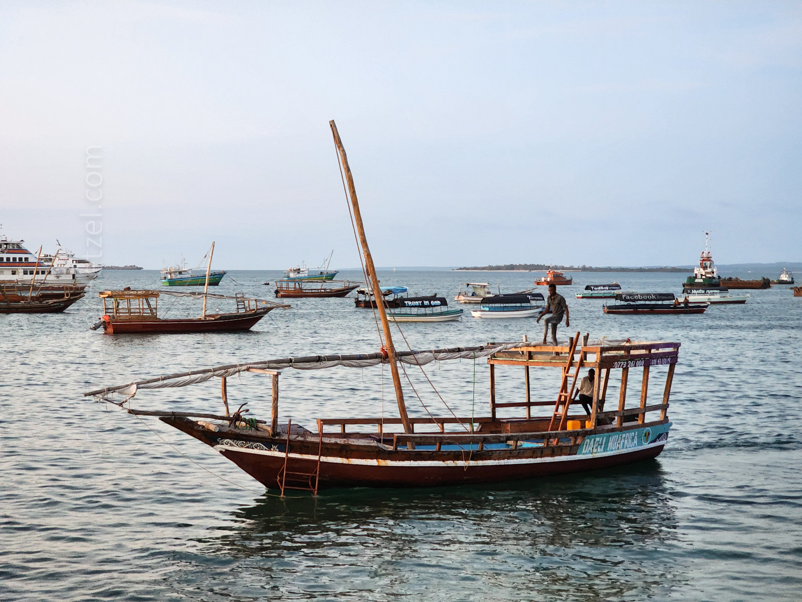 Dhows are traditional wooden-hulled Arabian boats, based on a shipbuilding tradition that has its origin in the coastal ports of the Sultanate of Oman. Photo by Jennifer.