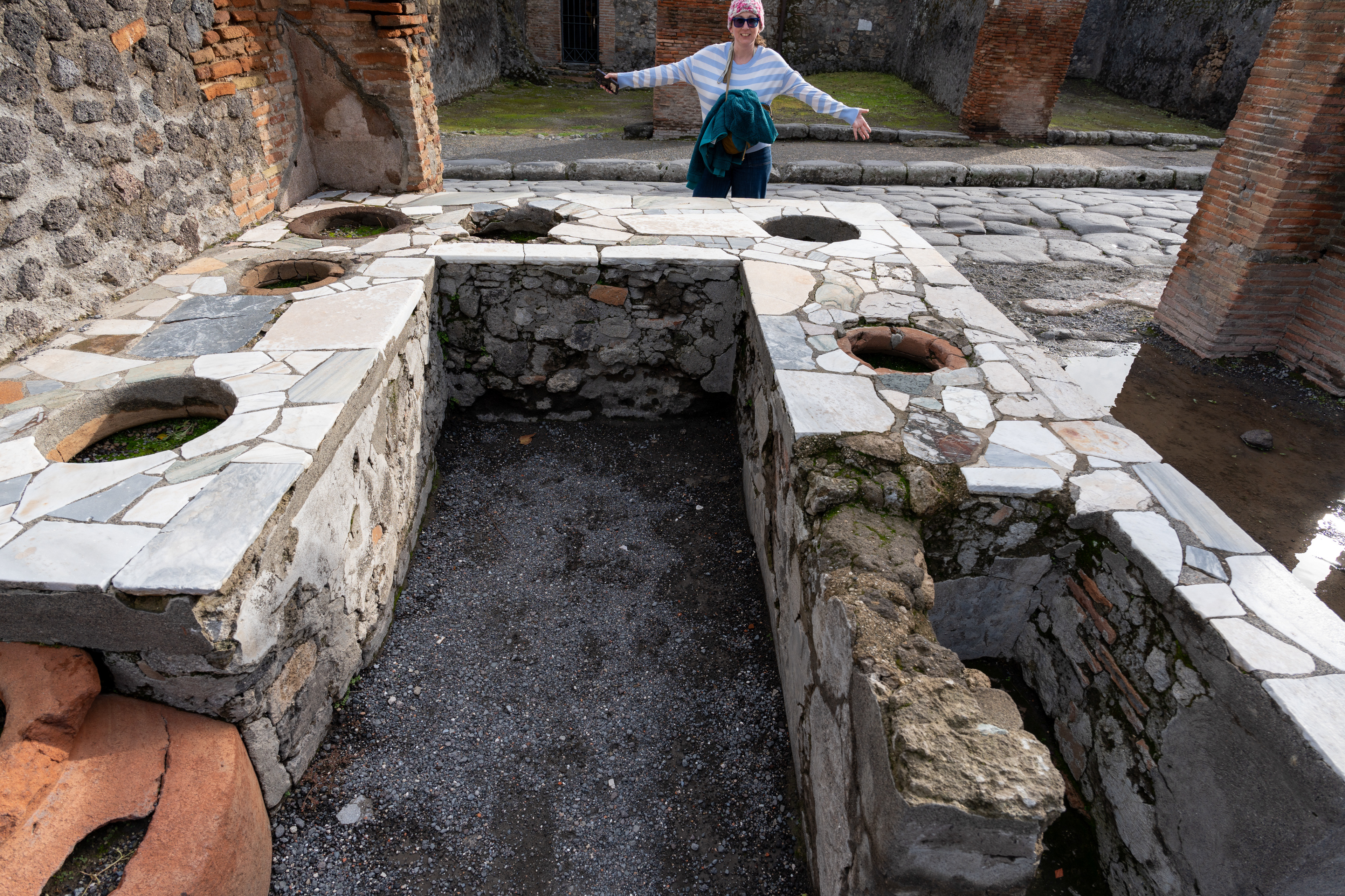 A Fast food eatery in Pompeii, referred to as a thermopolia. There were as many as 150 in the city.
