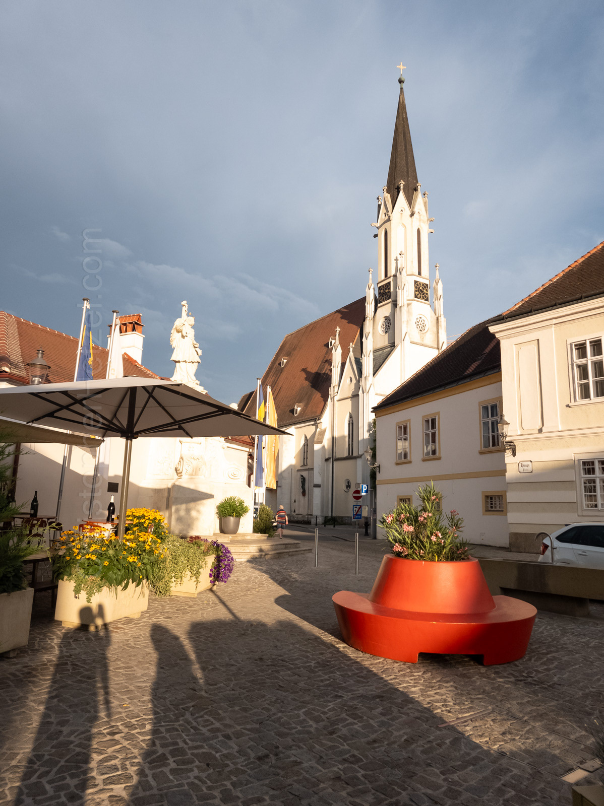 The Parish Church of the Assumption of Mary (built 1481; tower rebuilt 1868) in Melk town square.