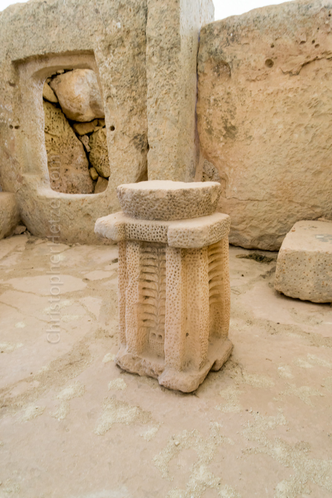 Carved, free-standing altar.