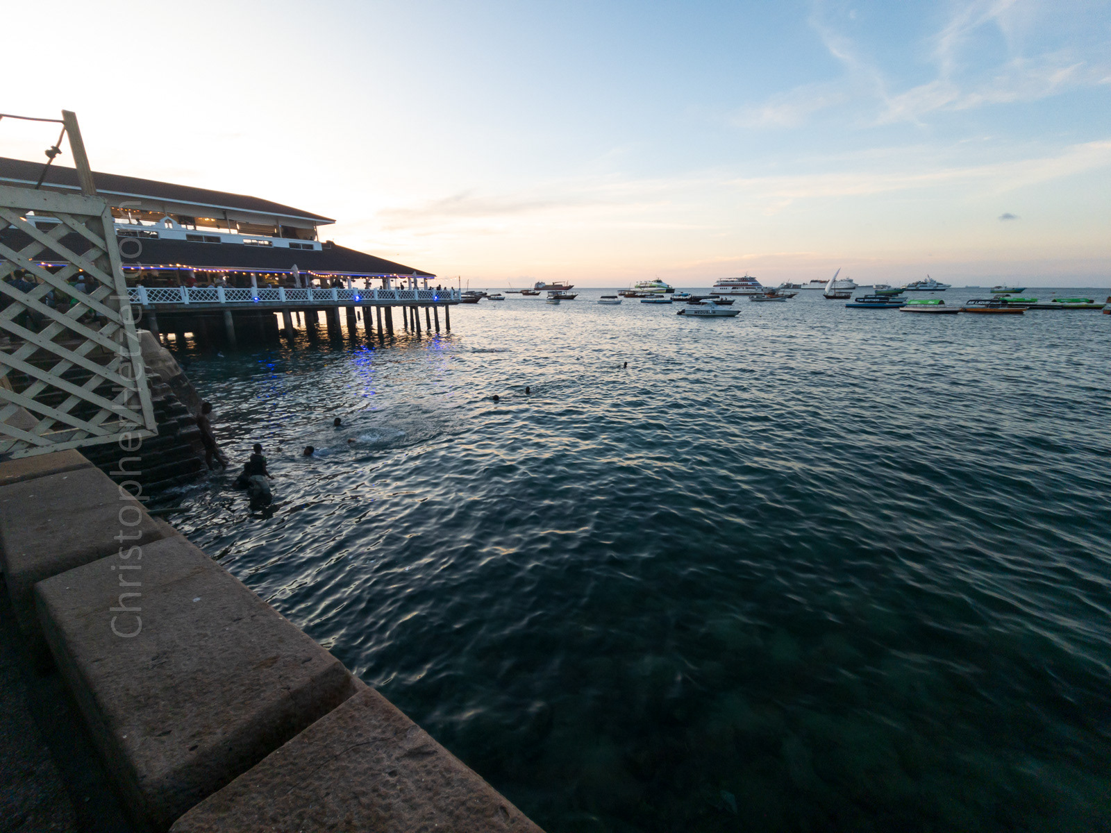 One of the nightly events at Forodhani Gardens, is to take a seat at the seawall, while watching local boys jumping off into the turquoise waters with the last rays of the sun.
